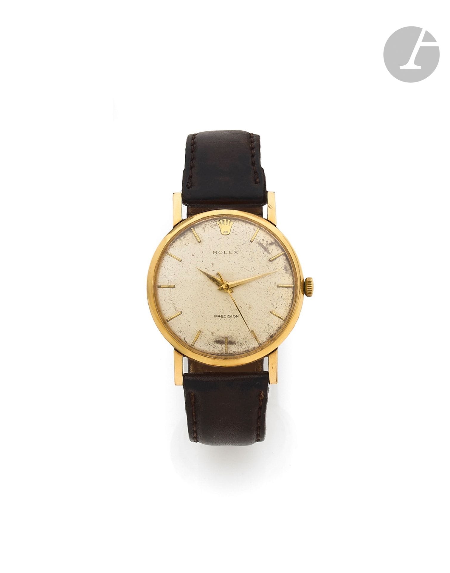 ROLEX
Year 50's
Yellow gold bracelet watch 9K (375) on leather made by Dennison for Rolex. English work.
Case: round with pressure bottom. Inside the case back signed Dennison for Rolex. Dial: silvered (pitted and stained) with applied baton hour markers, dauphine hands and center seconds. Signed Rolex.
Movement: mechanical, signed Rolex Geneva Leather strap with pin buckle.
Dial, case and movement signed.
Numbered 12376/ 2024XX
Diameter: 33 mm
Gross weight : 35,1 g