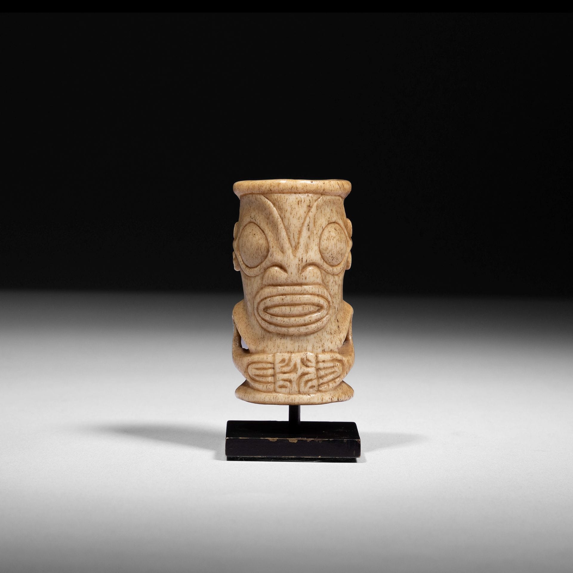 A beautiful classic ivi po'o ornament, a man's amulet, carved with the representation of a Tiki.

Marquesas Islands

Human bone, beautiful patina of use.

H ;5,3 cm



Provenance :

Anne and Jacques Kerchache Collection.



Exhibitions :

- Gems, Monumental Miniatures from America, Pacific, South East Asia and Africa, 2009 fig. 23

- Pierre Bergé &amp; Associés sale, June 13, 2010, lot 384.