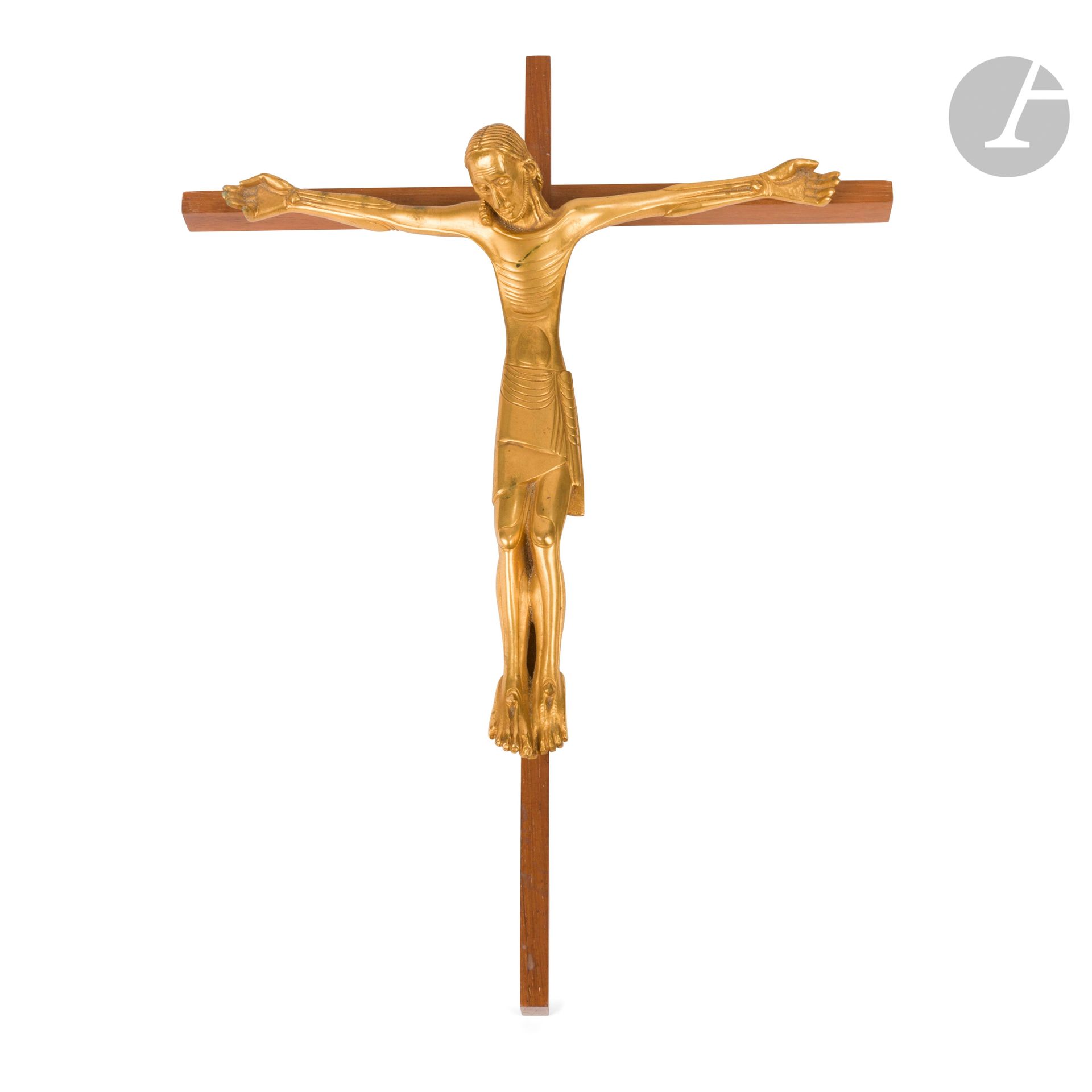 JEAN LAMBERT-RUCKI (1888-1967) 
Christ en croix
Épreuve en bronze doré. La croix en palissandre. Signée LAMBERT-RUCKI sur une partie latérale du bronze. H. Christ seul : 22,5 cm – H. totale : 40,5 cm