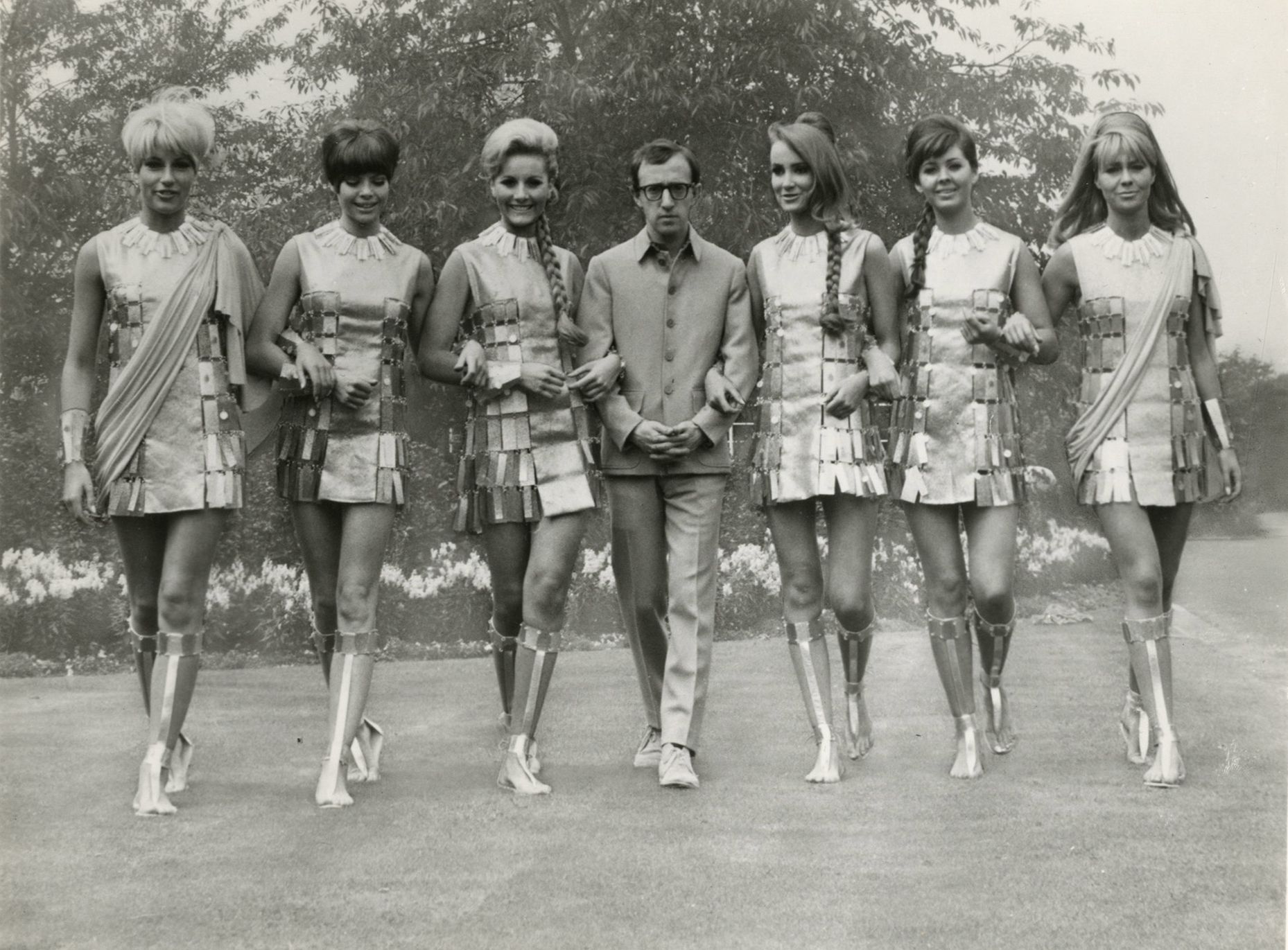 Unidentified set photographer
Woody Allen and actresses wearing dresses made by Paco Rabanne on the set of Casino Royale, 1967. 
Vintage silver print. 
Image: 17.3 x 23.3 cm 
Sheet : 20,5 x 25,5 cm 

Douglas Webb and Pamela Green are credited as set photographers on the set of Casino Royale.