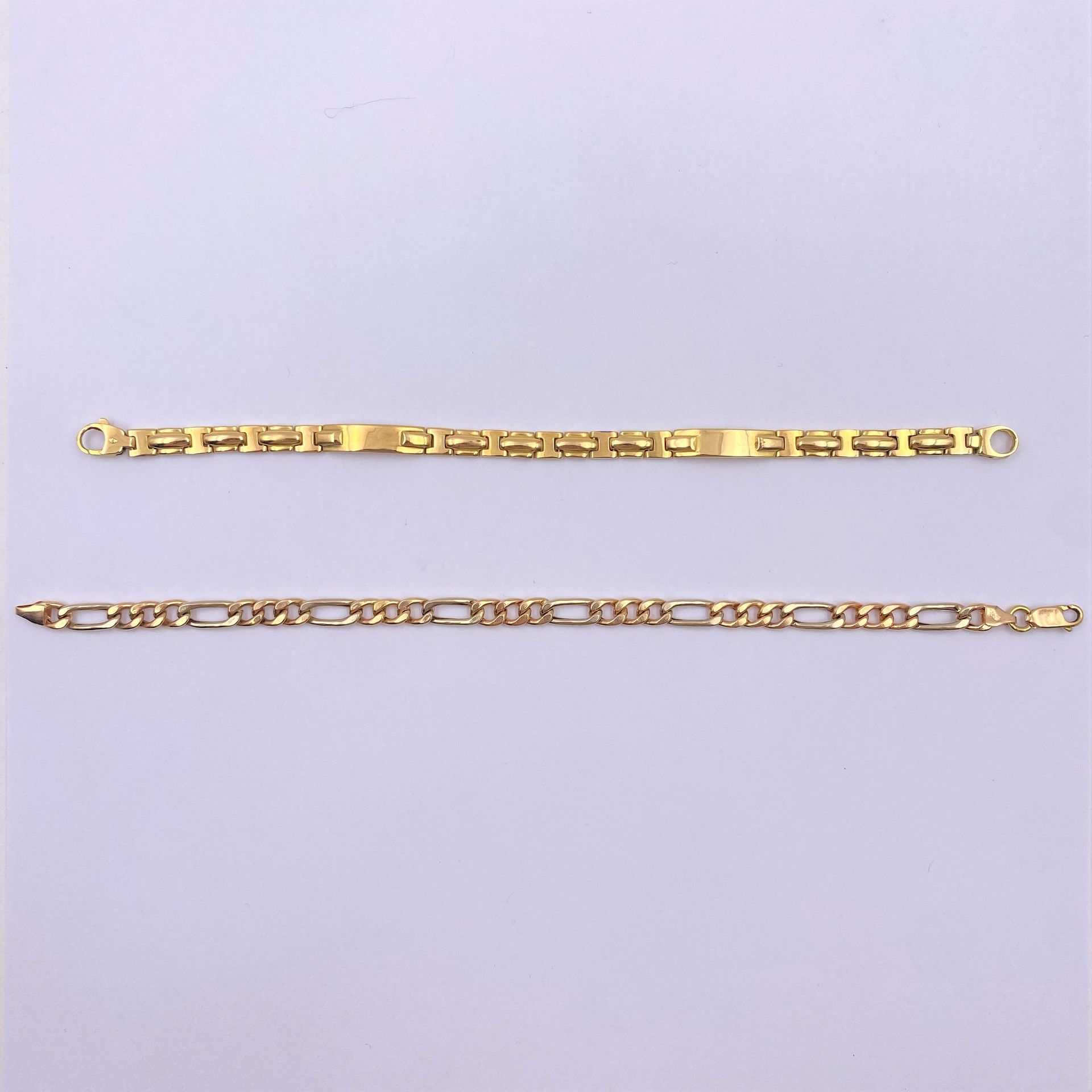 2 bracelets souples en or (18K). Poids: 23,3 g

Frais acheteur pièces et lots en or : 9,6% TTC -  8% HT 