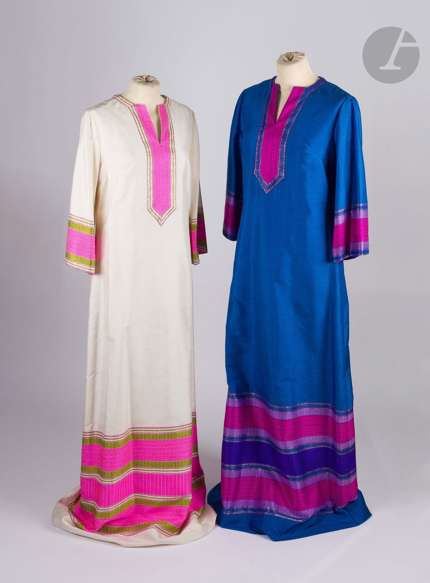 STAR OF SIAM, 1980s
Two Thai dresses in silk with cream and blue backgrounds
Size may correspond to a 34-36 approx.