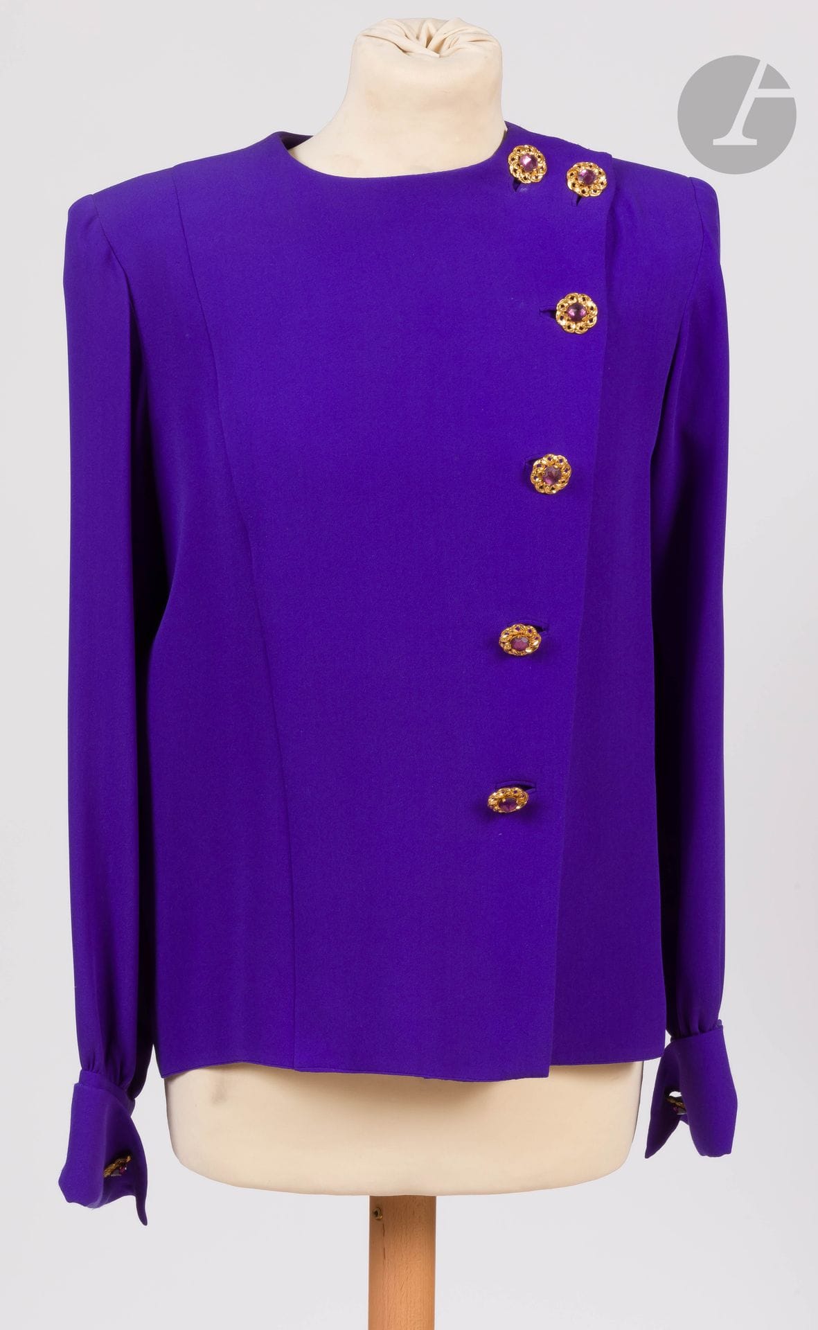 Yves SAINT LAURENT Haute Couture, 1980s
Two pieces: a purple crepe bodice with jewelled buttons, with a similar unbranded bodice made after the first.
Size may correspond to a 34-36 approx.