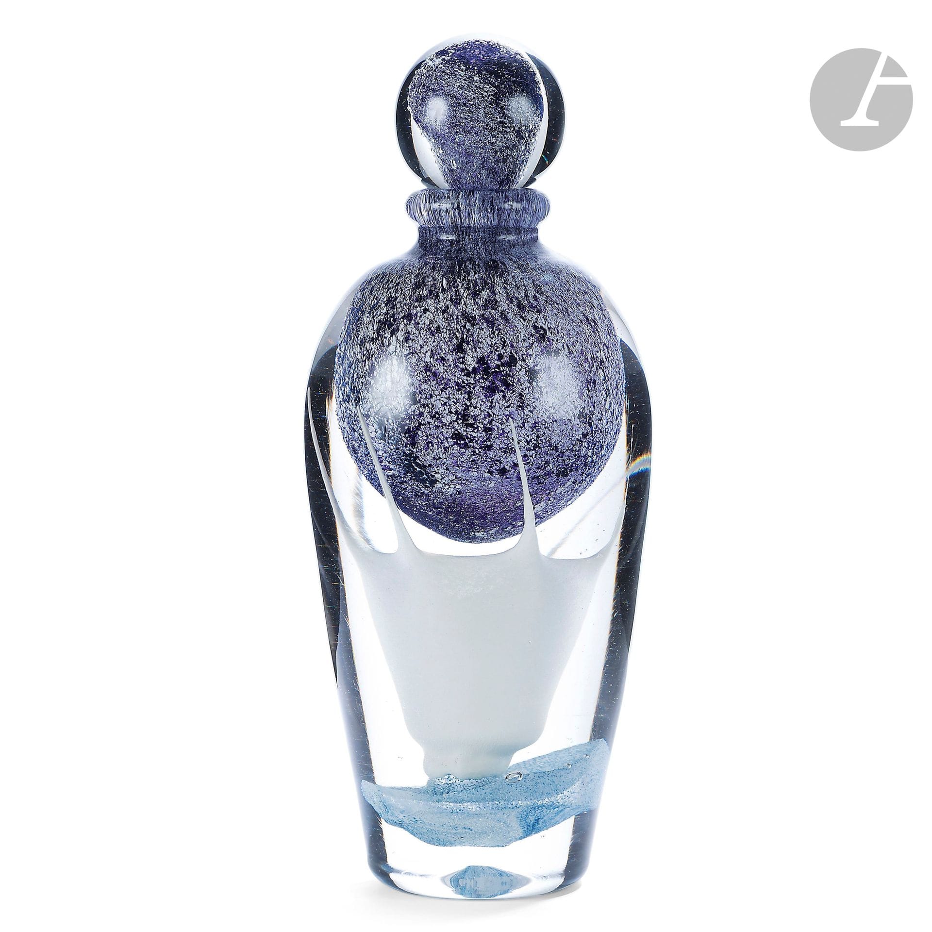 Jean-Claude NOVARO (France, 1943-2014)
Blown glass flask with violet decoration on the upper part and luminescent decoration on the lower part, sky-blue background. Signed and dated 2006 under the base. H. 32 cm - D. 13 cm