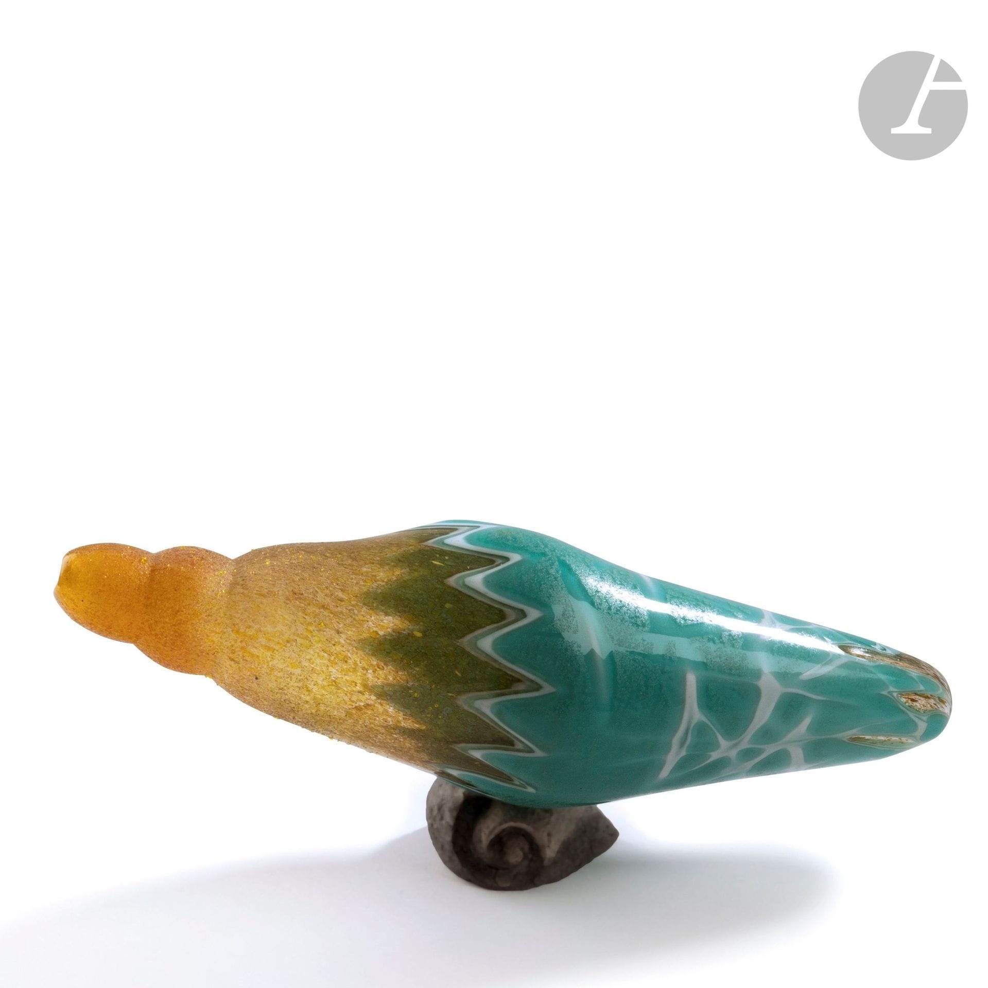 Isabelle POILPREZ (France, b. 1968) 
Shell
Aquatic sculpture in yellow enamelled blown glass, covered with a partially etched turquoise layer, resting on a raku base. H. 12 cm - W. 32 cm - D. 9 cm

Provenance: Élisabeth TAUVEL Collection, Paris