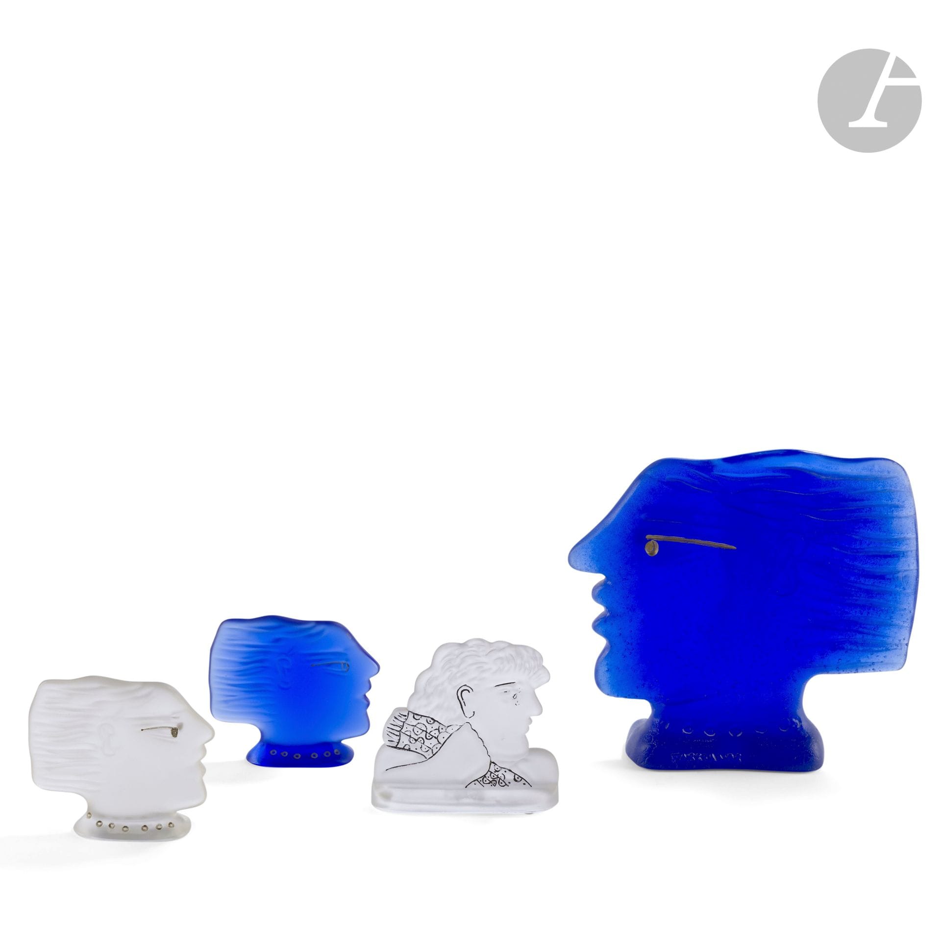 ALEKOS FASSIANOS (1935-2022) SCULPTOR &amp; DAUM ART GLASSMAKER - 4 WORKS 
- Kallisti, large version, numbered proof 33/200
Sculpture. Proof in blue pâte de cristal; gold highlights. Signed FASSIANOS and marked DAUM France on the base, numbered 33/200 below. H. 18.5 cm - L. 19 cm
- Kallisti
Two paperweight sculptures. One blue, the other frosted. Each signed FASSIANOS and marked DAUM France under the base. H. 9.3 cm - L. 10 cm
- Hercules and Léonté
Paperweight sculpture. Proof in pâte de cristal; frosted surface. Marked DAUM France under the base. H. 9.5 cm - L. 10 cm