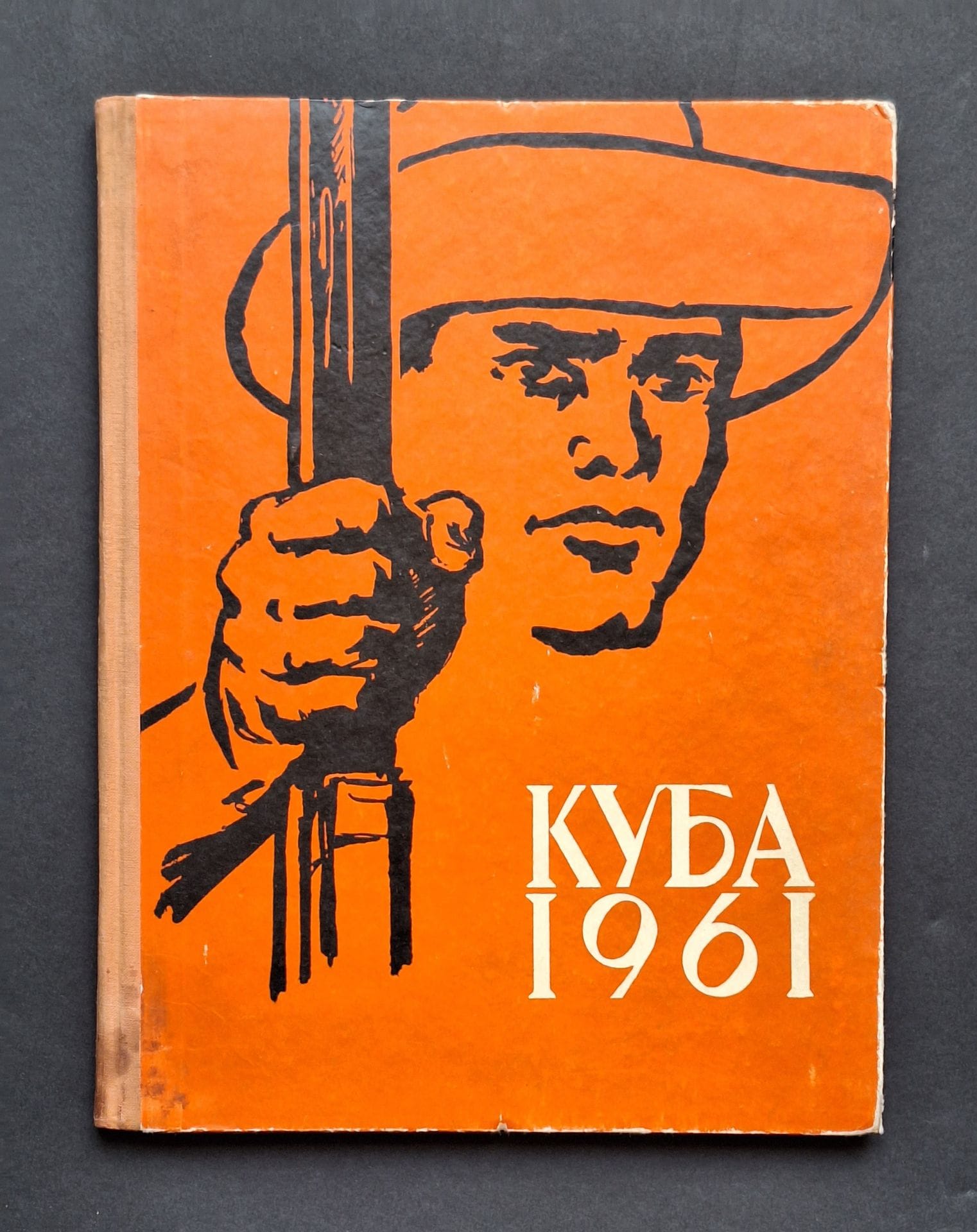 [CUBA]
Kuba 1961.
Russian edition, 1961.
In-4 (30 x 23 cm). First edition. 80 pp. Orange boards with black design and white title. Minor wear to boards.