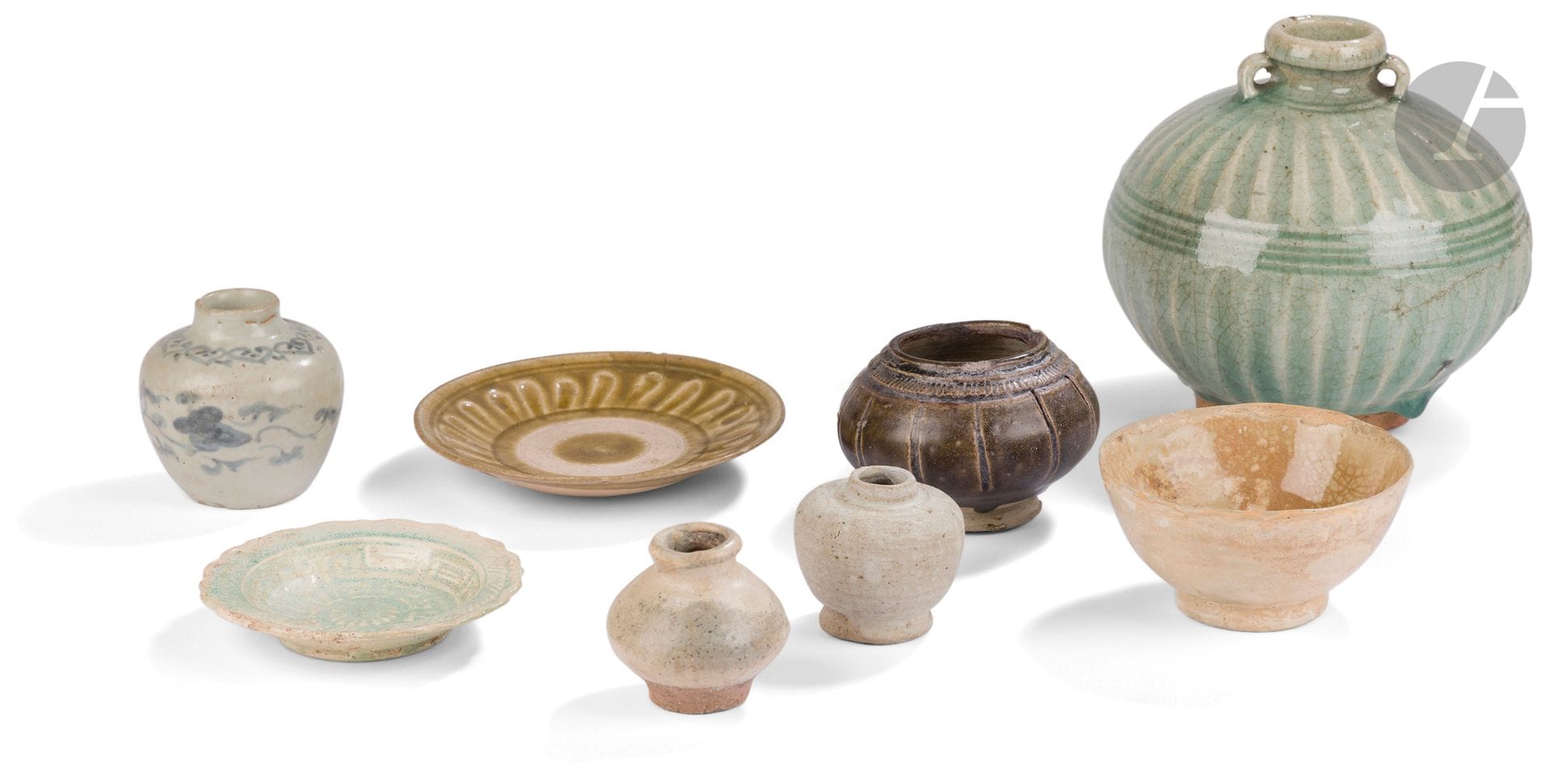 Eight ceramics, Southeast Asia, Sawankhalok, Vietnam and Cambodia, various periods, 12th - 15th century
Two celadon-glazed stoneware saucers, a buff-glazed stoneware bowl, three small jars, two white-glazed, one white with underglaze blue decoration, a celadon-glazed ring-handled jar and a brown-glazed stoneware jar.
Height: from 5.6 cm to 14.5 cm

Provenance : 
Former F. Barillet collection.