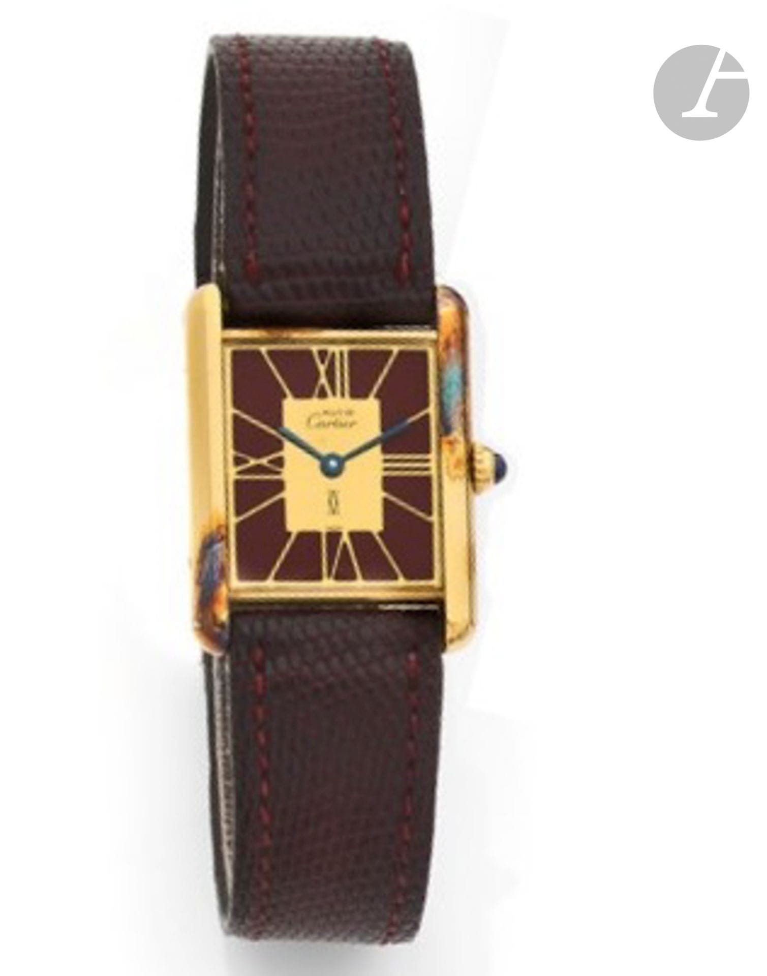 CARTIER
TANK MUST. REF. 681006. 
YEARS 90
Bracelet watch in vermeil on leather
Case: rectangular, yellow-gold-plated silver, screw closure.
Dial: burgundy and gold lacquered, applied hour-markers. Movement: quartz. 
Strap: leather with Cartier gold-plated metal buckle. 
Signed and numbered 63152. 
Diam. 31 x 23 mm. 
With: Cartier certificate.
(Battery to be changed, operation not guaranteed).