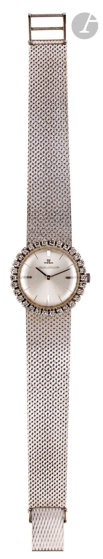 JAEGER LECOULTRE
ANNÉES 60
Montre bracelet de dame en or gris 18K (750) et diamants.
Boîtier : rond, lunette sertie de diamants.
Cadran : argenté, index bâton appliqués.
Mouvement : mécanique
Bracelet : intégré en or gris tissé, boucle simple. 
Signée et numérotée 29089. 
Diam. 25 mm. 
Long. : 17 cm.
Poids brut : 44, 60 g.