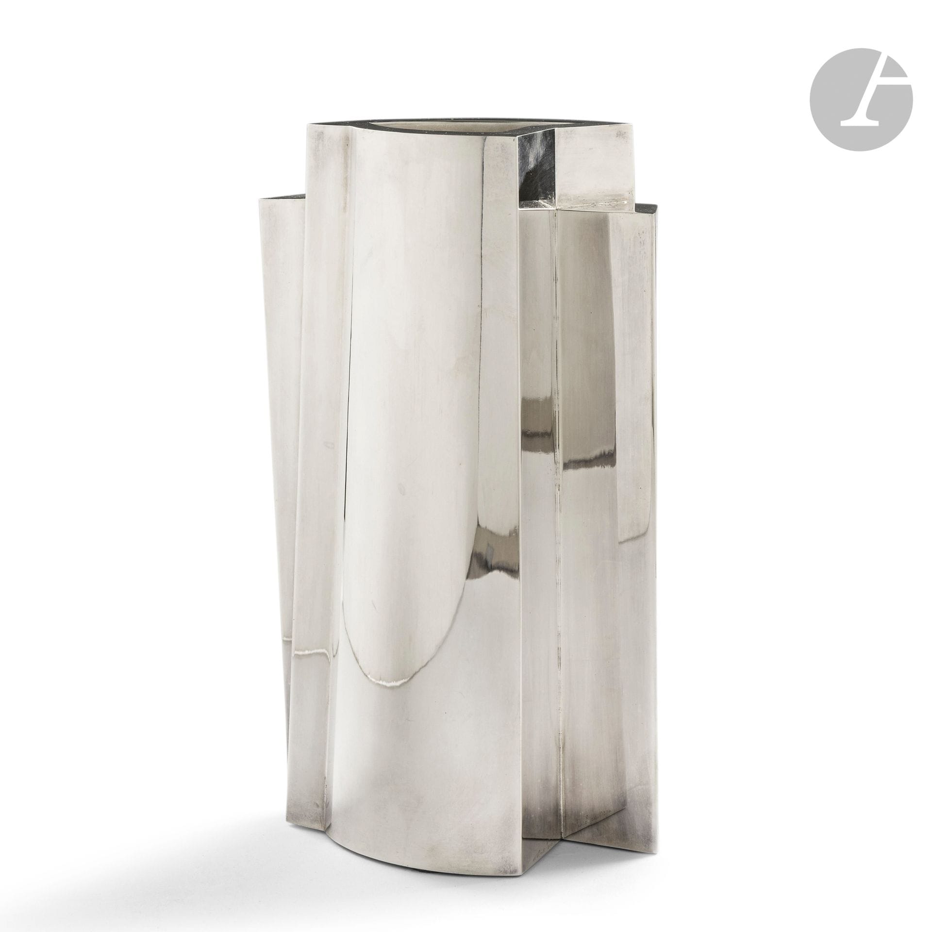 JUAN &amp; PALOMA GARRIDO (B. 1965) &amp; (B. 1968) GOLDSMITHS
Arc, model created in [2004], our proof numbered 8/25
Constructivist vase.
Proof in silver 925/1.000.
Signed GARRIDO and stamped 925/1.000 and Sterling towards the base and numbered 8/25 on the reverse.
Height: 29.5cm
Weight: 2.404,50 g

Important:
A certificate from the Maîtres Orfèvres will be given to the purchaser.

Bibliography:
Collective - Garrido orfebres (1994-2005) - Editions Litonor, 2005. Our vase model reproduced on page 109 and referenced on page 109.
