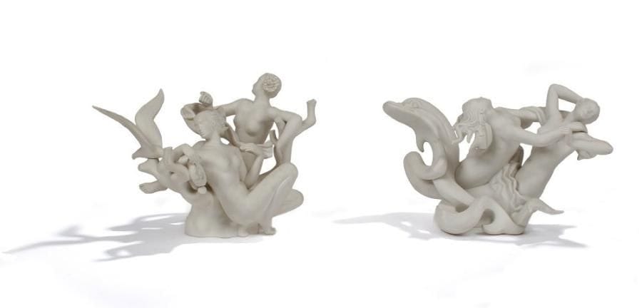 Henri Albert LAGRIFFOUL (1907-1981) Sculpteur & MANUFACTURE NATIONALE de SÈVRES
Mouettes et dauphins, modèle créé en 1952. Deux sculptures, formant pendant, issues d'un surtout de table.  Épreuves en biscuit de pâte dure.  Un infime éclat sur l'extrémité de la branche recevant la mouette.  Les deux pièces sont signées du cachet de la Manufacture,. l'une est datée (19)55, l'autre est datée 1956 et porte la signature du sculpteur LAGRIFFOUL.  21, 5 x 35 x 22 cm & 23 x 29 x 25 cm. Bibliographie : « Sèvres, la Manufacture au XXème Siècle » par Jean-Paul Midant. Éditions Michel. Aveline 1992. Partie centrale de ce modèle de surtout de table reproduite pages 156, 157, 158 & 159.