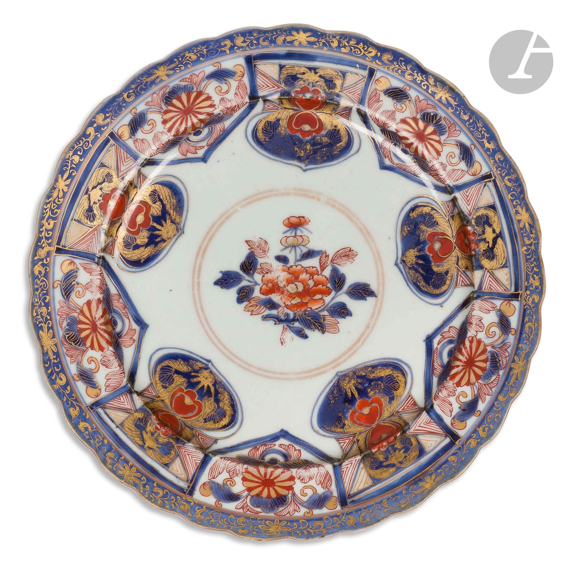 Japan
Round porcelain dish decorated with blue, red and gold Imari flowers in the center and tongue on the side.
18th century. 
D. 26 cm
Chips and cracks.

A bowl with polychrome decoration in the Sèvres style of gallant couples on a celestial blue background.
19th century. 
H. 7.5 cm, D. 14 cm
