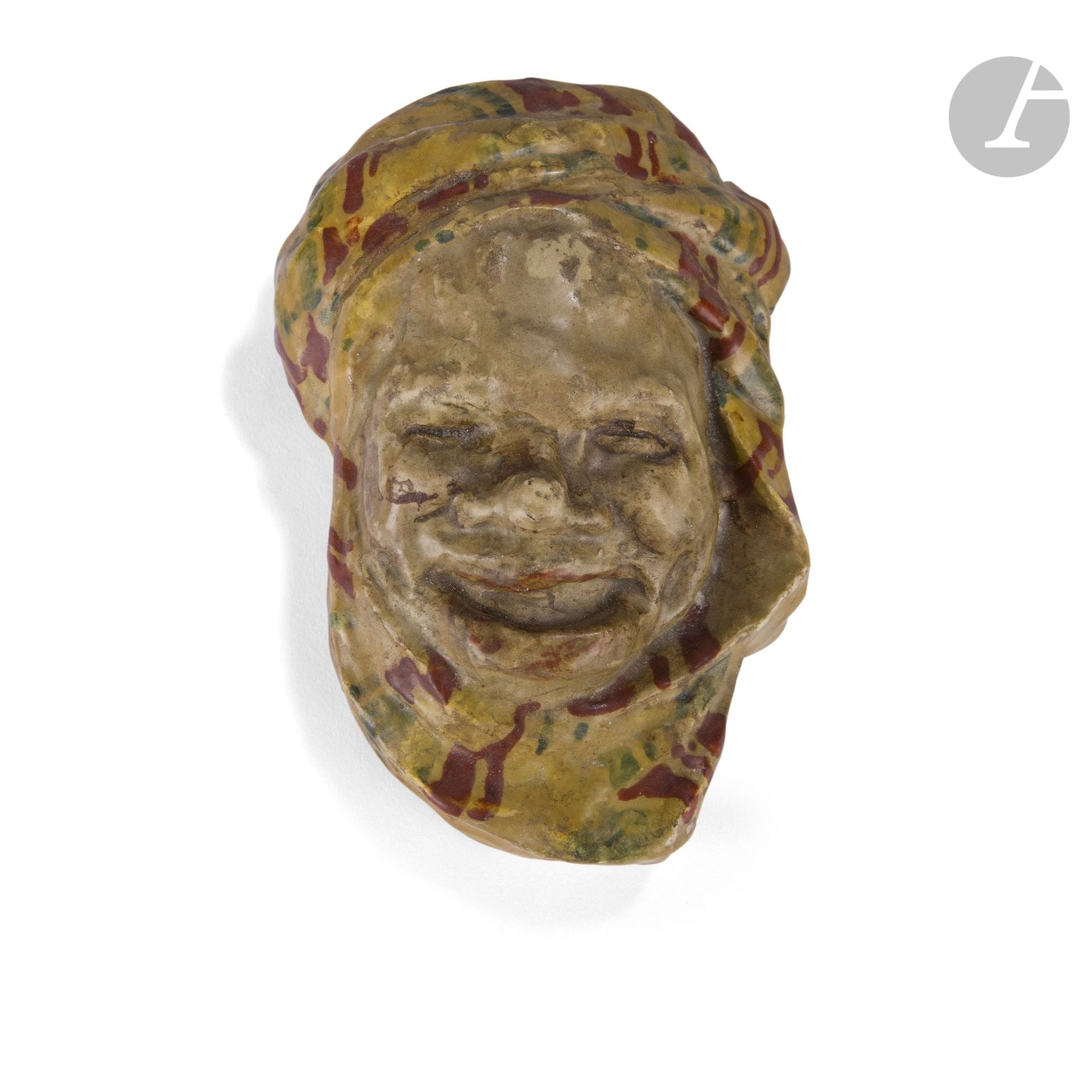 EDMOND LACHENAL (1855-1948)
Arab head with turban, the design attributed to Paul Loiseau-Rousseau (1861-1927)
Bouquetière d'applique. Polychrome enameled ceramic proof. Circa 1900. Signed LACHENAL on the back. H. 20 cm