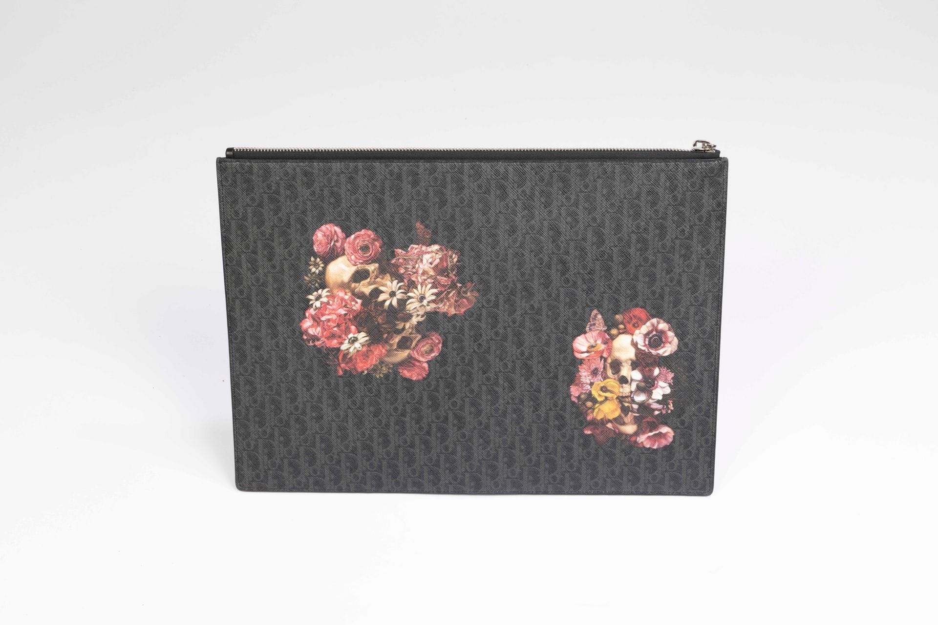 DIOR Homme
Black and grey Oblique coated canvas clutch bag with Vanités motif, 34 x 25 cm, in bag