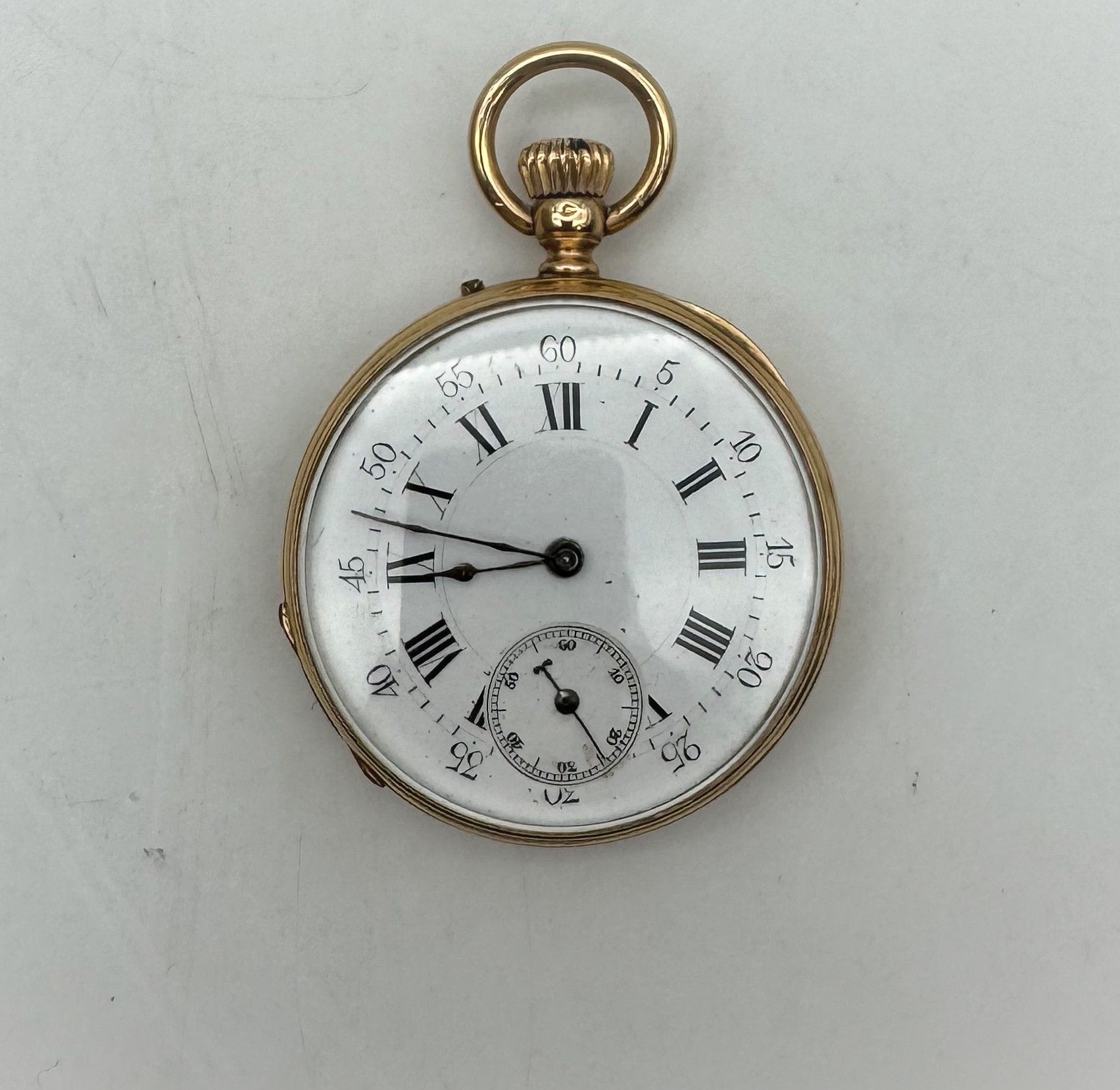 Montre de poche en or 750/°°° à double paroi.
PB 63.8 g
Frais acheteur pièces et lots en or : 9,6% TTC -  8% HT