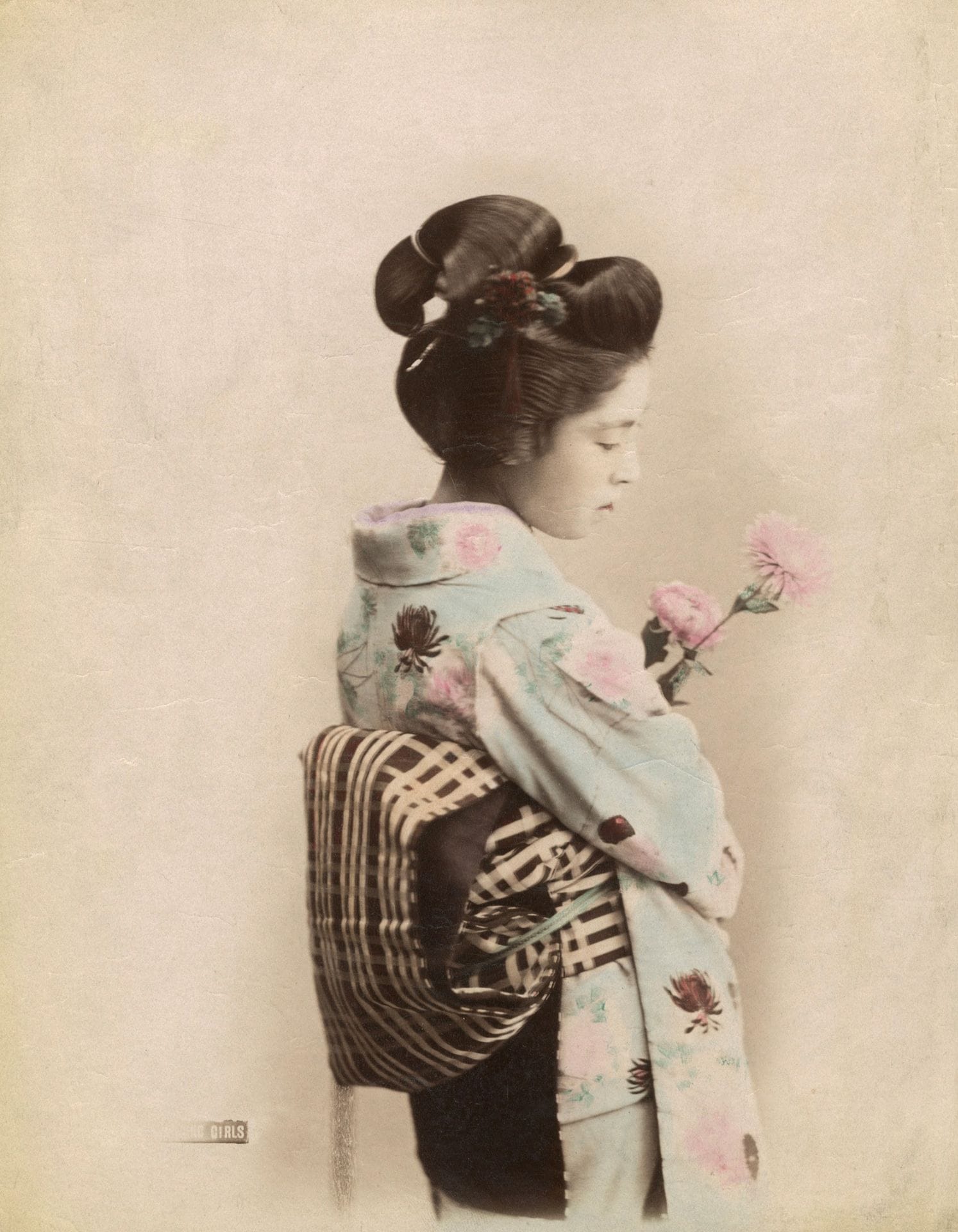 Unidentified photographer 
Japan, c. 1880-1900.
Yokohama. Waterfalls in Nikko. Mount Futago. Park. Cherry blossoms. Traditional architecture. Singers. Musicians. Geishas. Kyoto. Sacred red lacquer bridge. Horikiri Park. Nagasaki. Kobe Theater. Nikko. Buddhist temple. Bamboo plantation. Tea ceremony. 
Approximately 85 albumen prints, enhanced with color, mounted on cardboard. Some captions in bands in the negatives.
Medium format: 21 x 27 cm