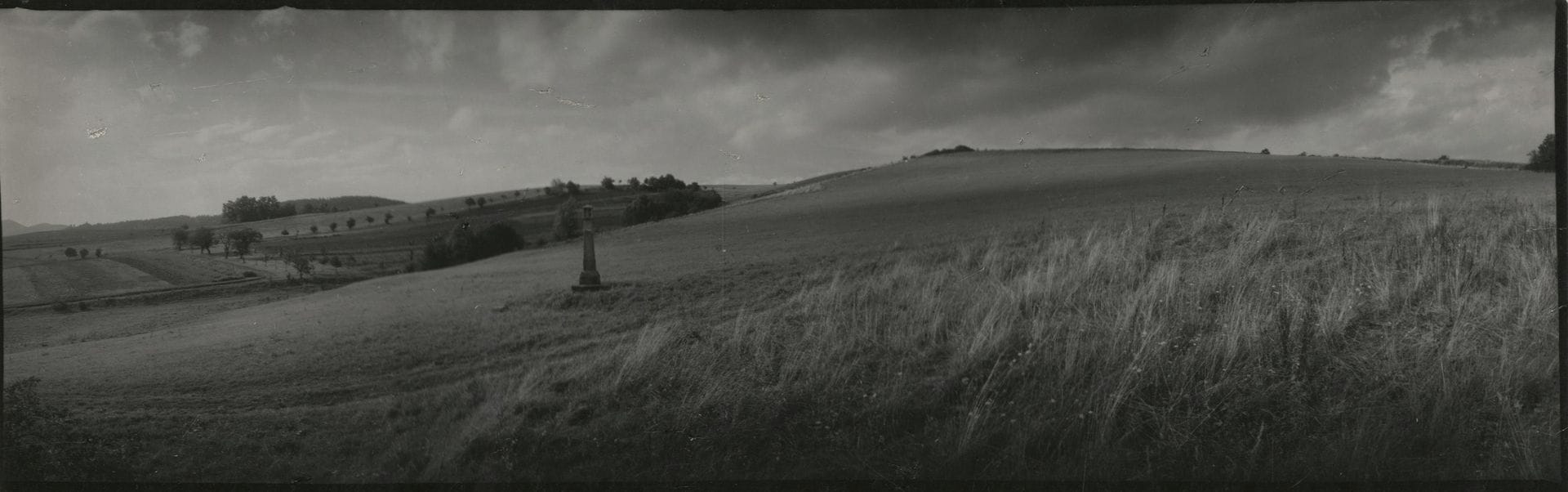 Josef Sudek (1896-1976)
Beskydy Plain, c. 1955-1960.
Vintage silver print. Signature of Petr Helbich (Sudek's assistant) on verso.
9.5 x 29 cm