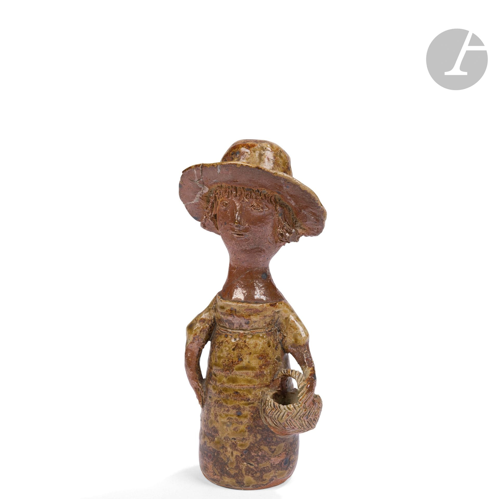 JACQUELINE LERAT (1920-2009)
Woman with aged basket and large hat
Anthropomorphic flowerpot. 
Stoneware. 
1960s. 
A chip reattached to the hat.
Signed LERAT towards the base. 
Height: 16 cm