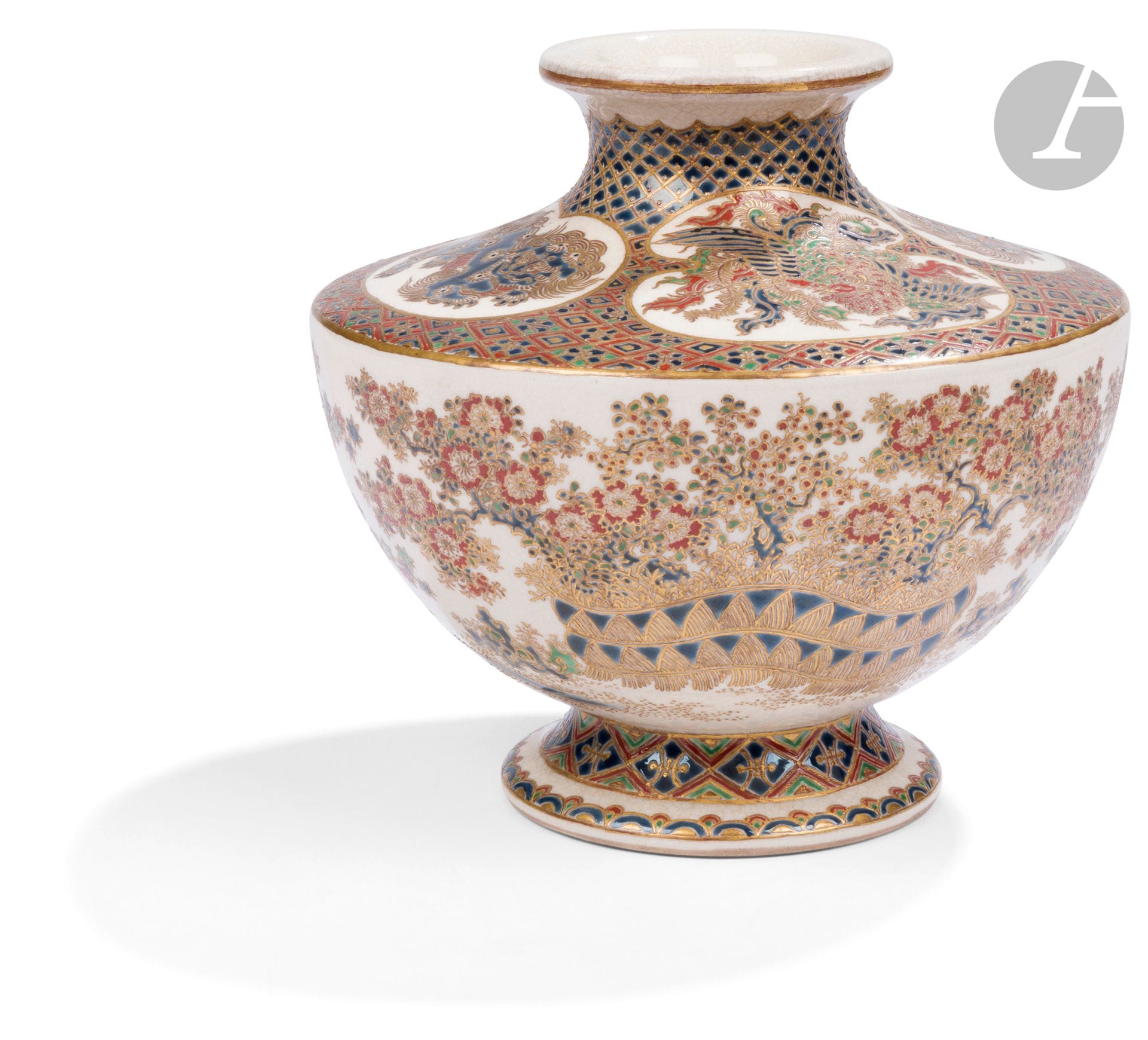 Satsuma earthenware vase, Japan, Meiji period (1868-1912)
Of flattened baluster form, decorated on the shoulder with four reserves of alternating red, blue and gold enameled shishi and hoho on a background of geometric motifs in the same shades. The body is decorated with stylized momiji, peonies and plum blossoms. Two bands of geometric decoration on the foot. Below, the Shimazu clan mon in blue on the glaze and the signature in red Daï nihon Satsuma yaki Tawara Kôseki no ga - 大日本薩摩焼俵兤石之画.
Height: 17.8 cm; width: 19 cm