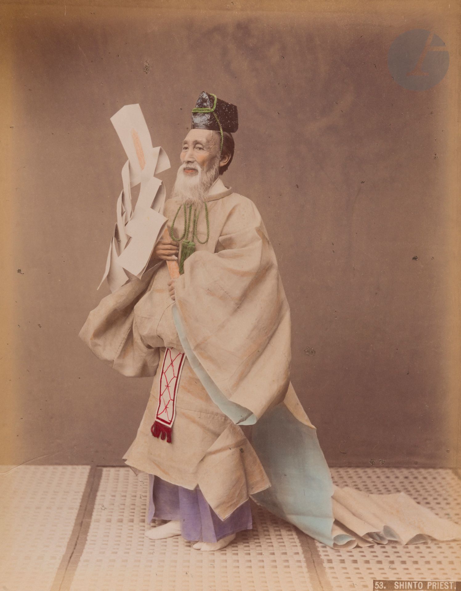 Kazumasa Ogawa (1860-1929) et divers 
Japon, c. 1880-1890. 
Temple Gate, Shiba Tokyo. Karamon. Iyemitsu temple, Nikko. Tennoji, Osaka. Temple Bell, Kawasaki. Bronze Images, Asakusa, Tokyo. Shinto priest. Japanese priest. Imaichi, Nikko road. Inari. Metaki waterfall. Fujiyama from Odaki waterfall. Uyeno park, Tokyo. Wisteria at Kameido, Tokyo. Amida, Nikko. Cave at Enoshima. Bridge, Fujikawa. Sacred bridge. Festival lanterns, Bentendori, Yokohama. Ojigoku. Girls in bedroom. Singing girl. Vegetables. Street amazake seller. Winter evening. Snow costume. Tea house girl. Writing letter. Travelling chair. Girls dancing. Miyako dance. 
Album in-4 oblong, plats en laque, composé de 50 épreuves sur papier albuminé, rehaussées à l’aquarelle, contrecollées sur cartons et protégées par des serpentes. Quelques légendes en bandeaux dans les négatifs. 
Format moyen des épreuves : 25,5 x 20 cm 

Une des épreuves de Kazumasa Ogawa est présente dans les collections du Getty Museum.