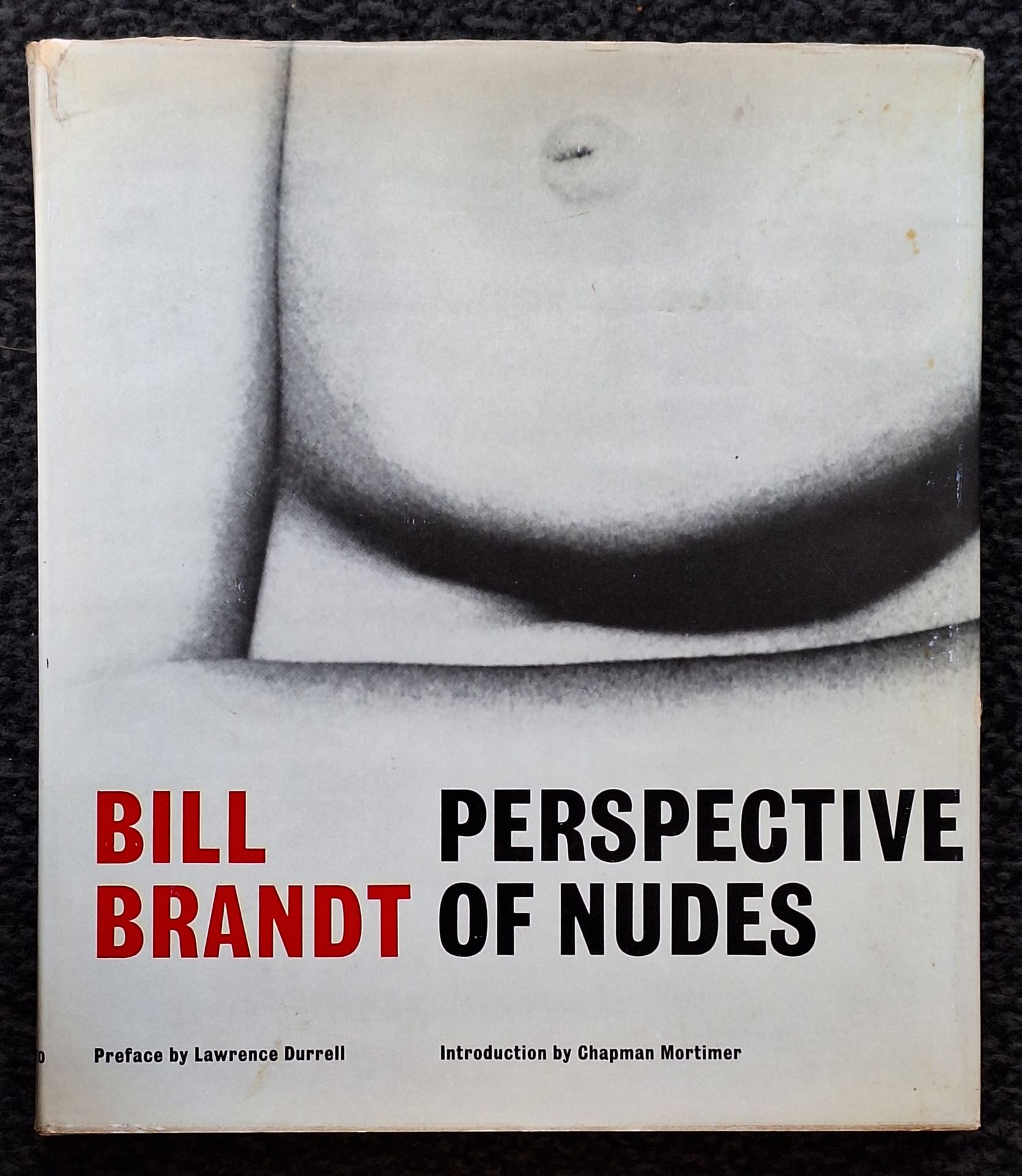 BRANDT, BILL (1904-1983)
Perspective of Nudes.
Amphoto, New York, 1961.
In-4 (28 x 24.5 cm). Original American edition. Introduction by Chapman Mortimer and preface by Lawrence Durell. 14 pp. of text. 90 photographs superbly reproduced in heliogravure. Publisher's boards in illustrated dust jacket.
Ref. Parr &amp; Badger, I, p. 216.