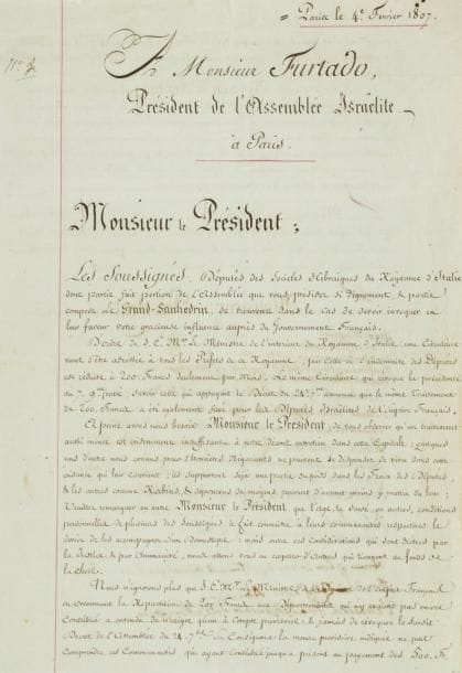 JUDAICA. [Abraham FURTADO (1756-1817)
banquier bordelais, ami de Malesherbes, Président de l'Assemblée des Notables juifs convoquée par Napoléon]. L.S. par 16 délégués des sociétés hébraïques du Royaume d'Italie, Paris 4 février 1807, à Furtado, « Président de l'Assemblée Israëlite » ; 2 pages grand in-fol.    Pétition des notables juifs d'Italie assemblés à Paris, à la suite de la réduction de leur indemnité mensuelle à 200 francs par le ministre de l'Intérieur du Royaume d'Italie. Un traitement « aussi mince est evidemment insuffisant à notre décent entretien dans cette capitale ; quelques uns d'entre nous connus pour d'honnêtes négociants ne peuvent se dispenser de vivre dans cette aisance qui leur convient ; ils supportent déjà une partie du poids dans les Fraix des Députés, & les autres comme Rabins, & dépourvus de moÿens peuvent d'autant moins y mettre du leur »... Ils le prient d'être leur interprète auprès du ministre de l'Intérieur de l'Empire, « afin qu'il daigne communiquer au gouvernement italien les eclaircissemens de fait qui sauvent nôtre droit »... Ont signé des députés et rabbins des départements italiens de la Brenta (Isaac Raffael Finzi), l'Adriatique (Jacob Emmanuel Cracovia...), le Mincio (Prospero Moïse Ariani, Abraham Cologna...), le Panaro, le Bas-Pô (Bondi Zamorani), le Crostolo, l'Adige (Isarel Coen...), et le Reno...