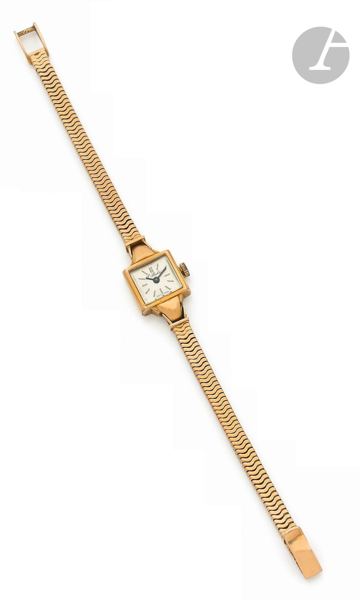 PAUL BUHRE
ANNÉES 40
Petite montre bracelet de dame en or jaune 18K (750). Travail suisse d’origine russe. 
Boîtier: carré à attaches
Cadran: argenté, signé.
Mouvement: mécanique
Bracelet: tubogas en or jaune, boucle simple.
Numérotée 50668.
Diam.: 14mm 
Longueur: 17,5cm.
Poids brut: 26,25g
En l’état