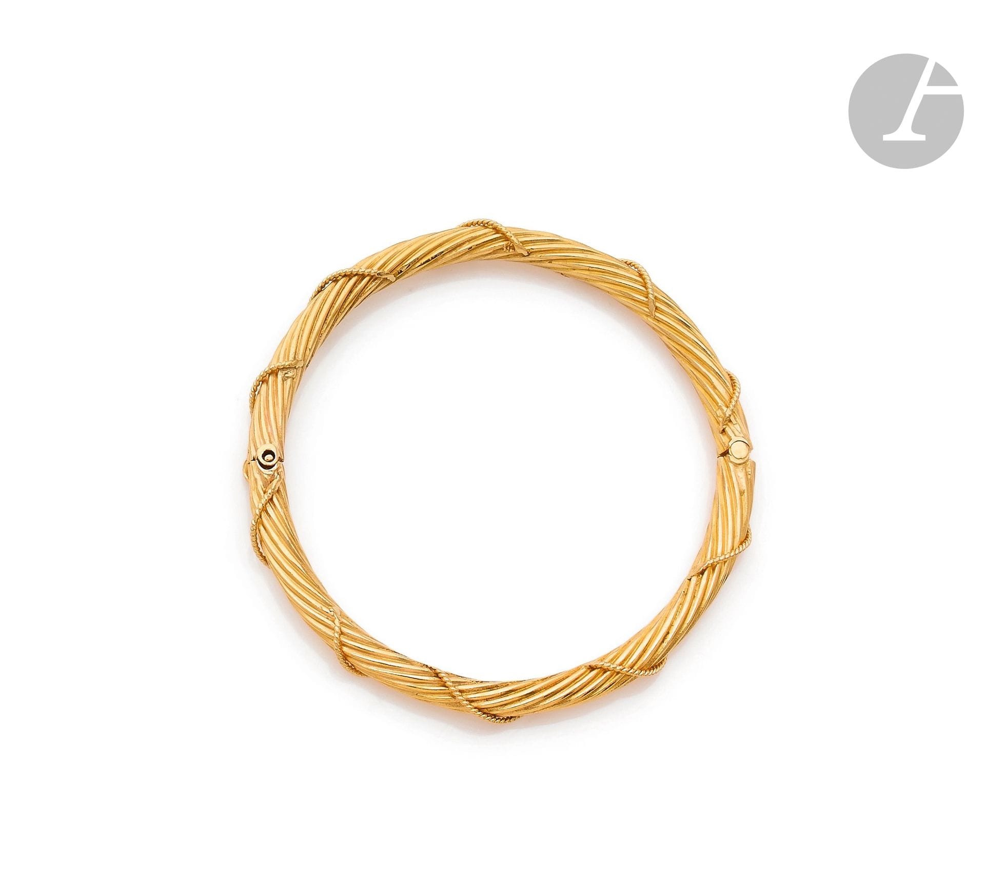 Twisted bracelet with cords in 18K (750) gold. Length: 18.5cm approx. Weight: 17.8g
A gold bracelet