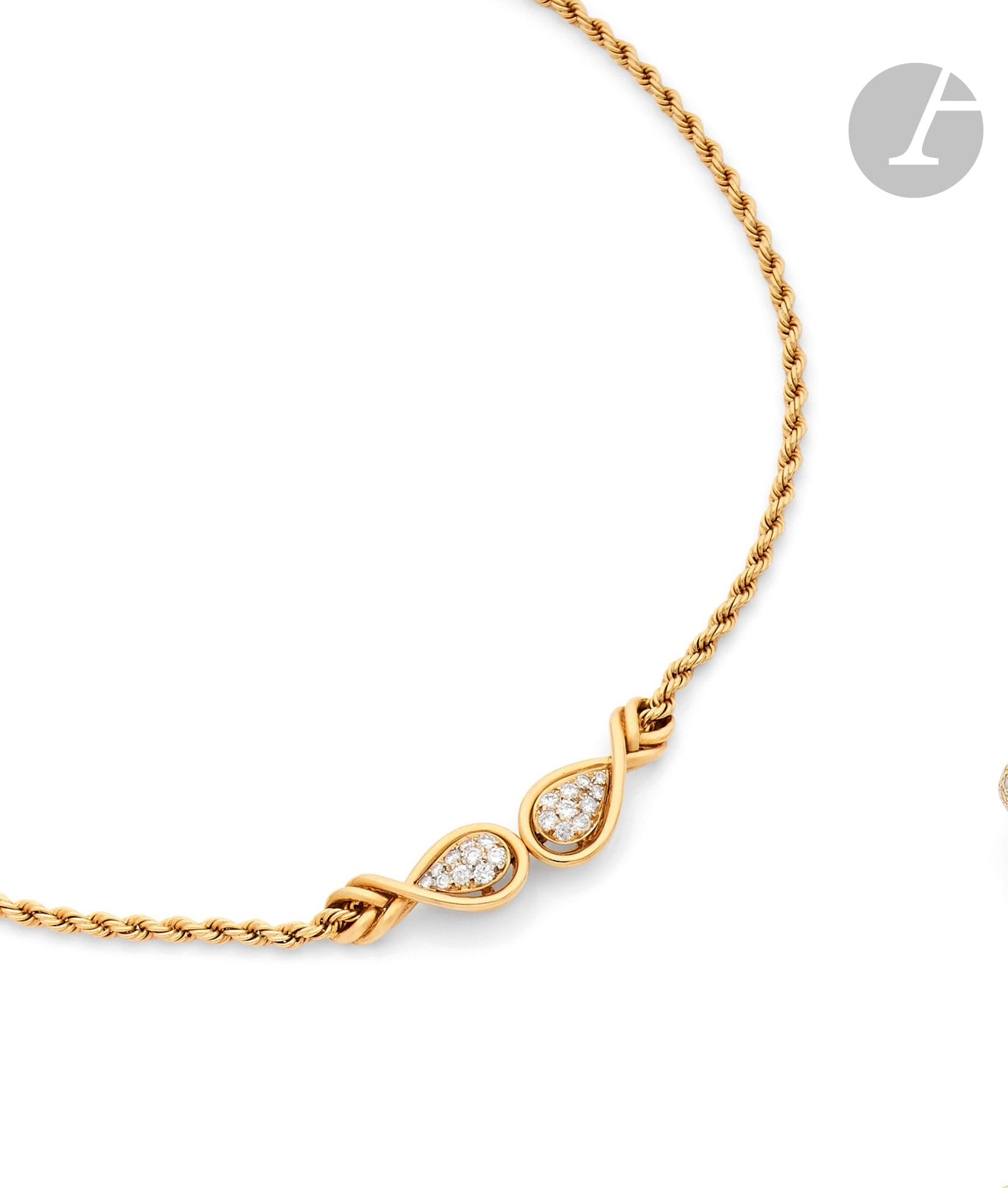 MAUBOUSSIN
Twisted necklace in 18K (750) gold, adorned with two oval motifs paved with round brilliant-cut diamonds. Signed. French work, 1980s. Length: approx. 39cm. Gross weight: 26.7g
A Mauboussin diamonds necklace