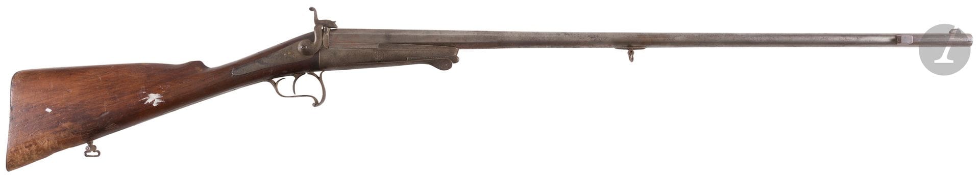 Fusil de chasse à broche, un coup, calibre 20. 
Canon rond à pans au tonnerre, avec tenon de baïonnette. Platine arrière avec restes de signature «Brun (…) Donjon». Garnitures en fer. Crosse en noyer (usures). 
A.B.E. Vers 1870.