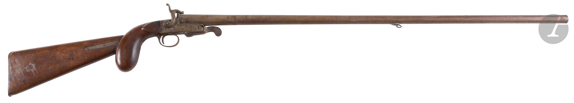 Fusil à broche de braconnier, un coup, calibre 16. 
Canon rond en deux parties, bascule gravée. Crosse en noyer démontable. 
A.B.E. (oxydations). Vers 1870.