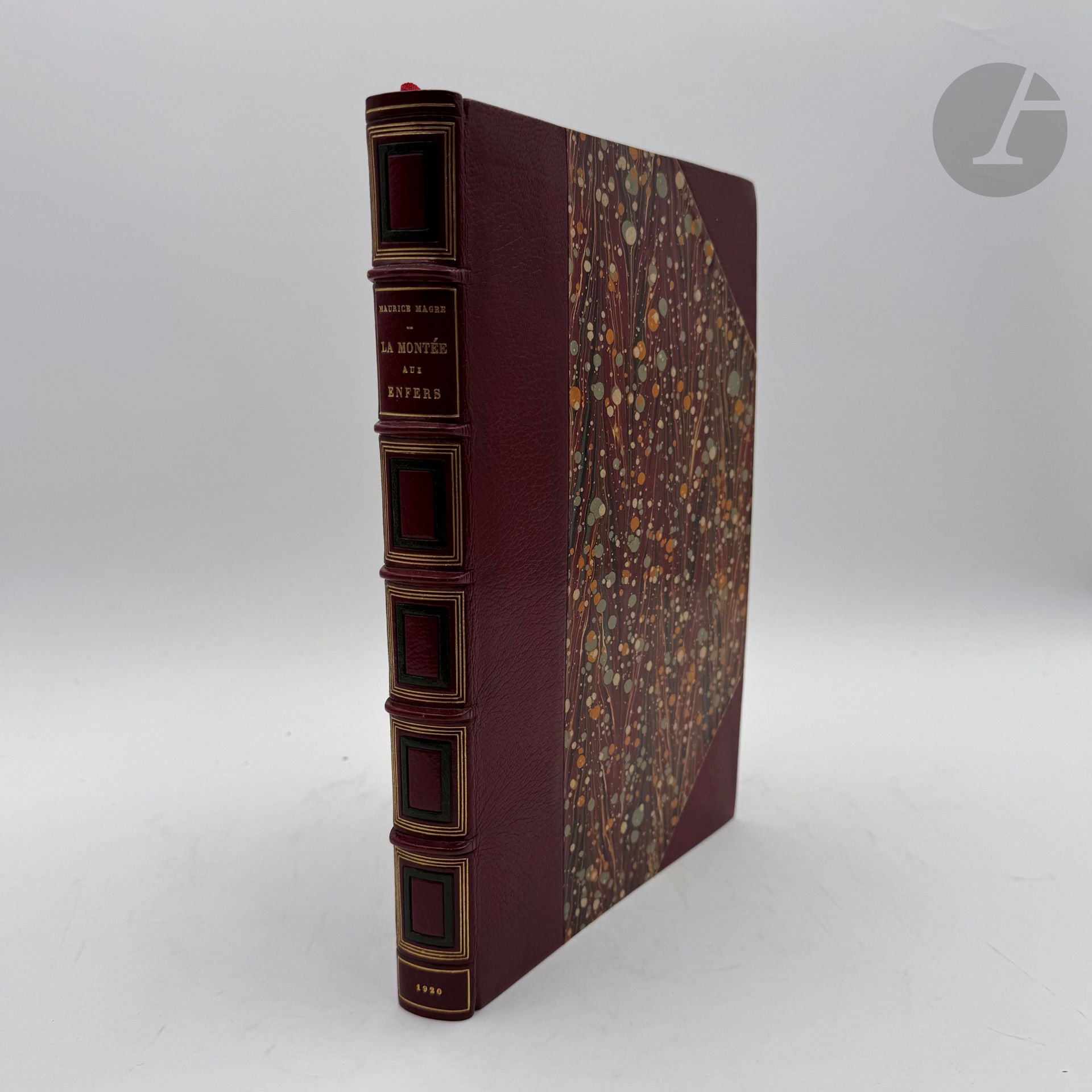 CHIMOT (Édouard) - MAGRE (Maurice).
La Montée aux Enfers. Poésies.
Paris : Le Livre du bibliophile, L'Édition, 1920. — Grand in-8, demi-maroquin rouge à coins, dos à nerfs orné de filets dorés et de cadres mosaïqués de maroquin vert foncé, tête dorée, non rogné, couverture et dos conservés (P. L. Martin).
Édition recherchée, tirée à 580 exemplaires, illustrée de 35 compositions d'Édouard CHIMOT (1880-1959), dont 23 dessins reproduits en noir à pleine page et en cul-de-lampe, et 12 superbes eaux-fortes originales en couleurs hors texte sous serpente légendée.

Un des 500 exemplaires numérotés sur papier vergé d'Arches, très bien relié par Pierre Lucien Martin.

Restaurations au dos de la couverture.