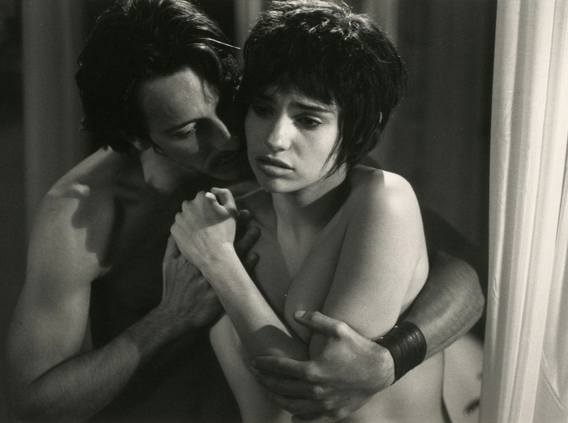 Unidentified photographer 
Béatrice Dalle and Jean-Hugues Anglade in Jean-Jacques Beineix's 37°2 le matin, 1986. 
Vintage silver print. Printed caption on verso. 
17.2 x 24 cm