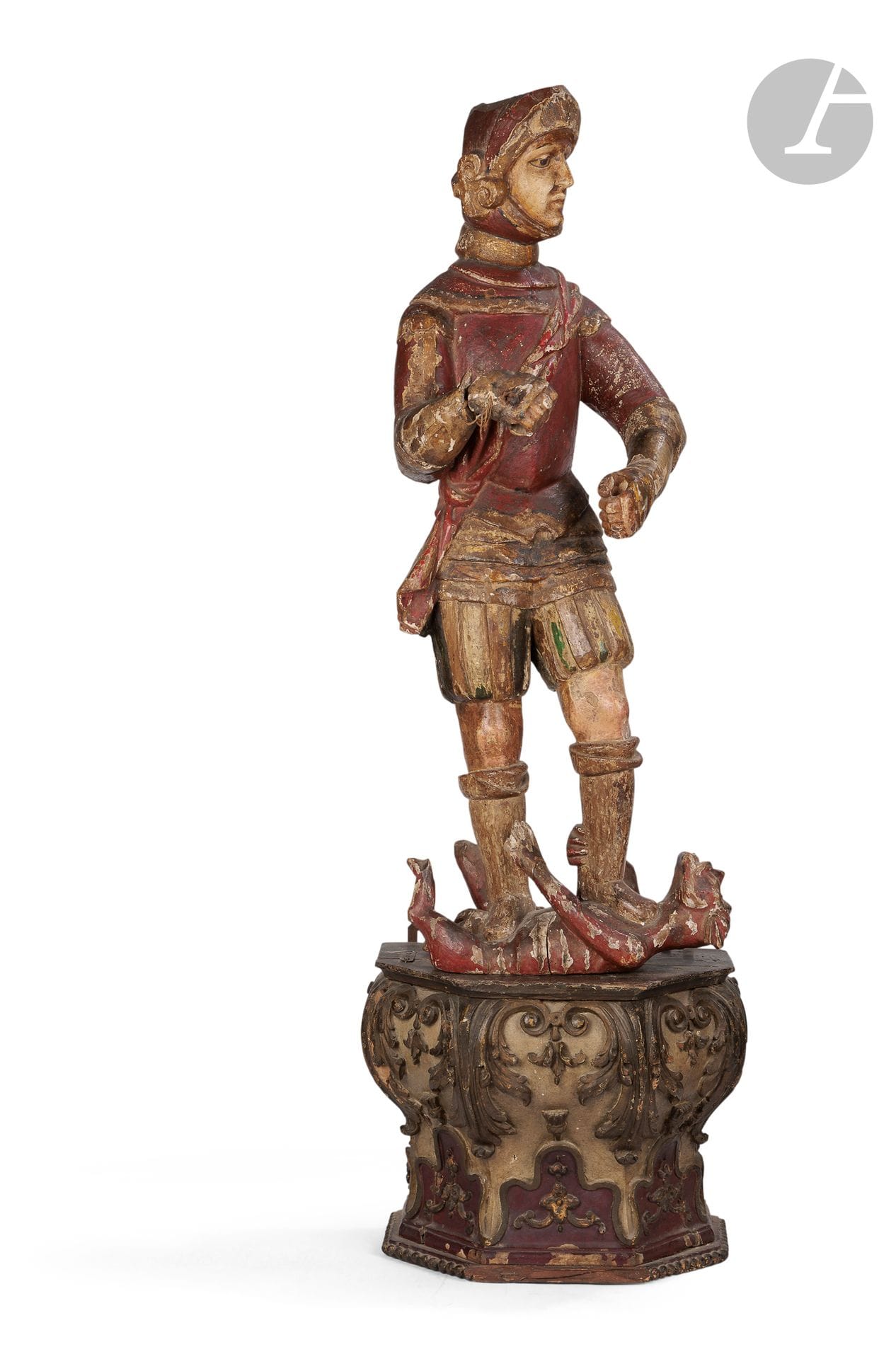 France ou Italie vers 1600 
Saint Michel terrassant le Mal 
Fort relief en bois polychromé 
H. :  85 cm repose sur une console d'applique en bois polychromé de la fin du XVIIe siècle 
Accidents, manques et restaurations