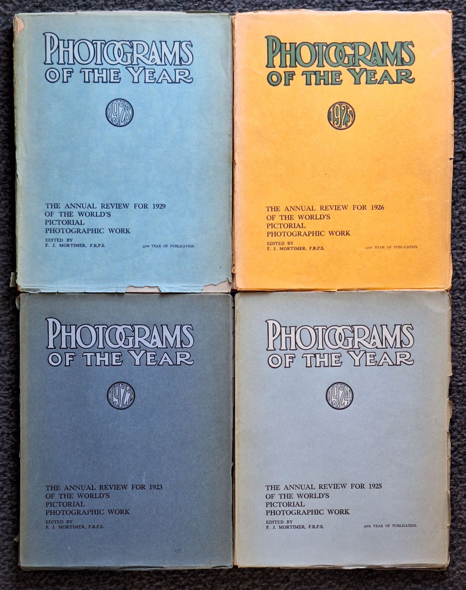 PHOTOGRAMS OF THE YEAR
4 volumes
The Annual Review of the world's pictorial Photographic Work. 
F.J. Mortimer, London, 1923, 1925, 1926 & 1929.
In-4 (28 x 22 cm). Éditions originales. 64 planches photographiques par volume. Photographies par Léonard Misonne, Puyo, Laura GIlpin, Bertram Park, Angus Basil, Robert Demachy, F.J. Mortimer, F. Drtikol, e.a. Couvertures souples titrées, avec usures d'usage; intérieur très beau.