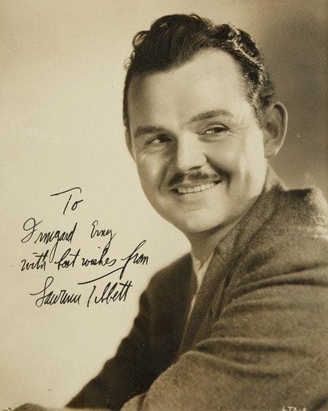 Lawrence TIBBETT (1896-1960) baryton et comédien américain. Photographie dédicacée; 24,5 x 20 cm sous verre.Beau portrait dédicacé à Irmgard Erny
