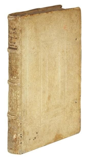 DINUS MUGELLANUS
Dyni Muxellani I. V. doct. celeberrimi commentaria in regulas Iuris pontificii. Lugduni: Ant. Vincentium, 1552. - In-8, (20 ff.), 285 pp., (1 f.). Peau de truie, plats ornés d'un encadrement extérieur composé d'une frise historiée encadrant un décor de rinceaux au centre bordé d'un cadre de larges filets droits et obliques, trous de liens, dos à nerfs (reliure de l'époque). Nouvelle édition du commentaire de Dinus Mugellanus (1253?-1303) des Regalae Juris accompagné des gloses du jurisconsulte au parlement de Paris Charles Du Moulin (1 500-1566). Parmi les pièces liminaires figure un avis au lecteur de Charles du Moulin suivi d'une épître dédicatoire de Nicolas Bohier. Impression lyonnaise de Jean Pidié pour Antoine Vincent. Belle reliure de l'époque décorée d'une frise historiée en encadrement montrant des scènes religieuses portant ces légendes en latin: "Hic est filiu(s) meus dilec(ctus)" - "Ecce agnus dei qui tol(lis)" - "Mors ero m(ors) tua omors". Annotations anciennes sur la première garde et le titre. Petits trous de vers aux charnières et sur le premier plat, manque les liens ainsi que la seconde garde blanche. Galerie de ver aux deux premiers feuillets sans atteinte au texte, bas du titre abîmé suite à l'effacement d'une note ou d'une signature.