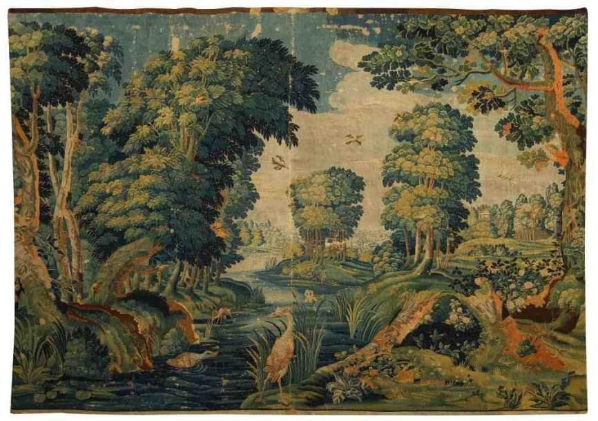 FLANDRES
Panneau en tapisserie figurant une scène de chasse dans une perspective paysagée de parc. XVIIe siècle. (Manque la bordure, restaurations et faiblesse de trame). 240 x 440 cm