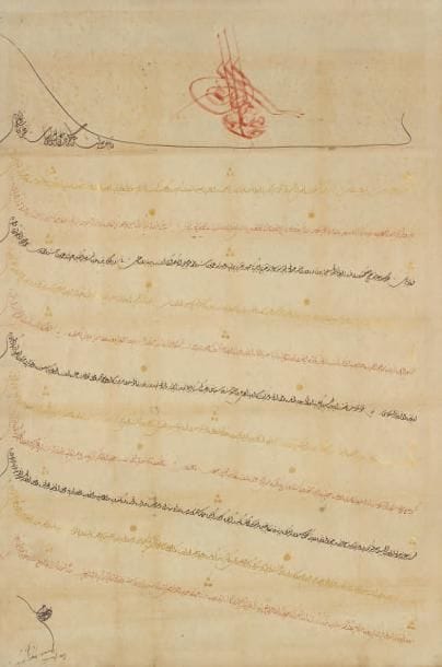 Grand brevet de nomination, nichân, pour le consul de France à Chypre, Turquie, Constantinople, daté 1247 H./1832 Acte sur papier de douze lignes de texte en écriture dîvânî alternativement à l'encre noire, rouge et or, enluminé de groupes de points dorés. Le document est surmonté d'une large tughra du sultan Mahmûd II (r. 1808-1839) à l'encre rouge. La signature en bas à droite porte l'annotation: «Case première. Quarante septième pièce». Ce brevet a été établi pour la nomination d'Alphonse Botu comme consul de France à Chypre par le sultan Mahmûd II, sur demande de l'ambassadeur de France à l'époque, à savoir le baron de Varenne, en remplacement du consul précédent, Alexandre Pillavoine. Dim. dans cadre: 112,5 x 72,5 cm (Petites taches et marques de pliures) L'île de Chypre, en turc «Kibris», est officiellement cédée par Venise à l'Empire Ottoman en 1573. Cette domination dure jusqu'en 1878, date à laquelle la Grande-Bretagne obtient gouvernance de l'île par le sultan Abdülhamid. La nomination d'Alphonse Botu comme consul s'inscrit donc pendant cette longue période ottomane. Les firmans, ou décrets impériaux, sont parmi les plus importants documents légués par l'Empire ottoman pour l'histoire de la diplomatie, des lois et de la vie économique à l'époque ottomane. Selon la teneur de ces décrets, le berat, qui annonce la mise en application d'une décision impériale, prend une dénomination particulière. Ici, il s'agit d'un nichân, c'est-à-dire de la nomination d'un haut dignitaire, en l'occurrence, le nouveau consul de France. Lecture et identification du document par M. le Professeur Gilles Veinstein, Collège de France