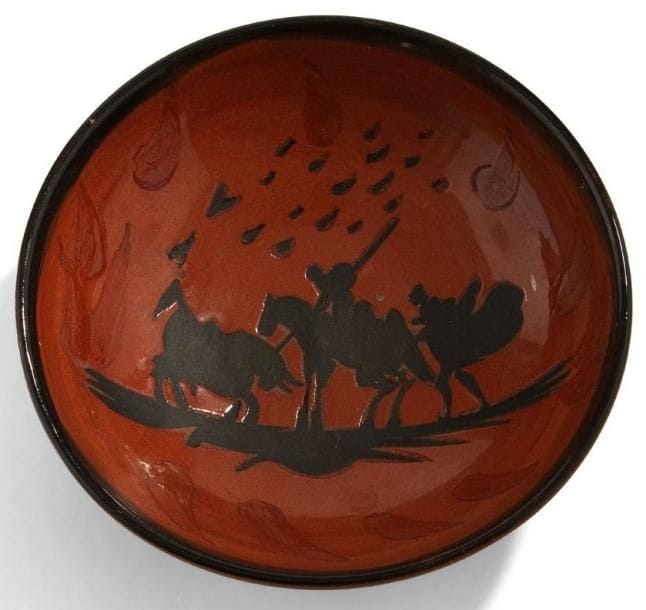 Pablo PICASSO (1881-1973) & MADOURA
Picador, modèle créé en 1953. Coupelle creuse. Édition originale limitée à cinq cents exemplaires réalisés chez Madoura. Épreuve en terre de faïence rouge tournée, décor à l?engobe et émail, paraffine, couverte noir. Marquée MADOURA Édition PICASSO et numérotée 354/500 au revers. Diamètre: 16 cm. Bibliographie:. «Picasso, catalogue de l?oeuvre céramique édité 1947-1971» par Alain Ramié. Editions Madoura, 1988. Modèle identique reproduit page 115 sous le numéro 211 du catalogue