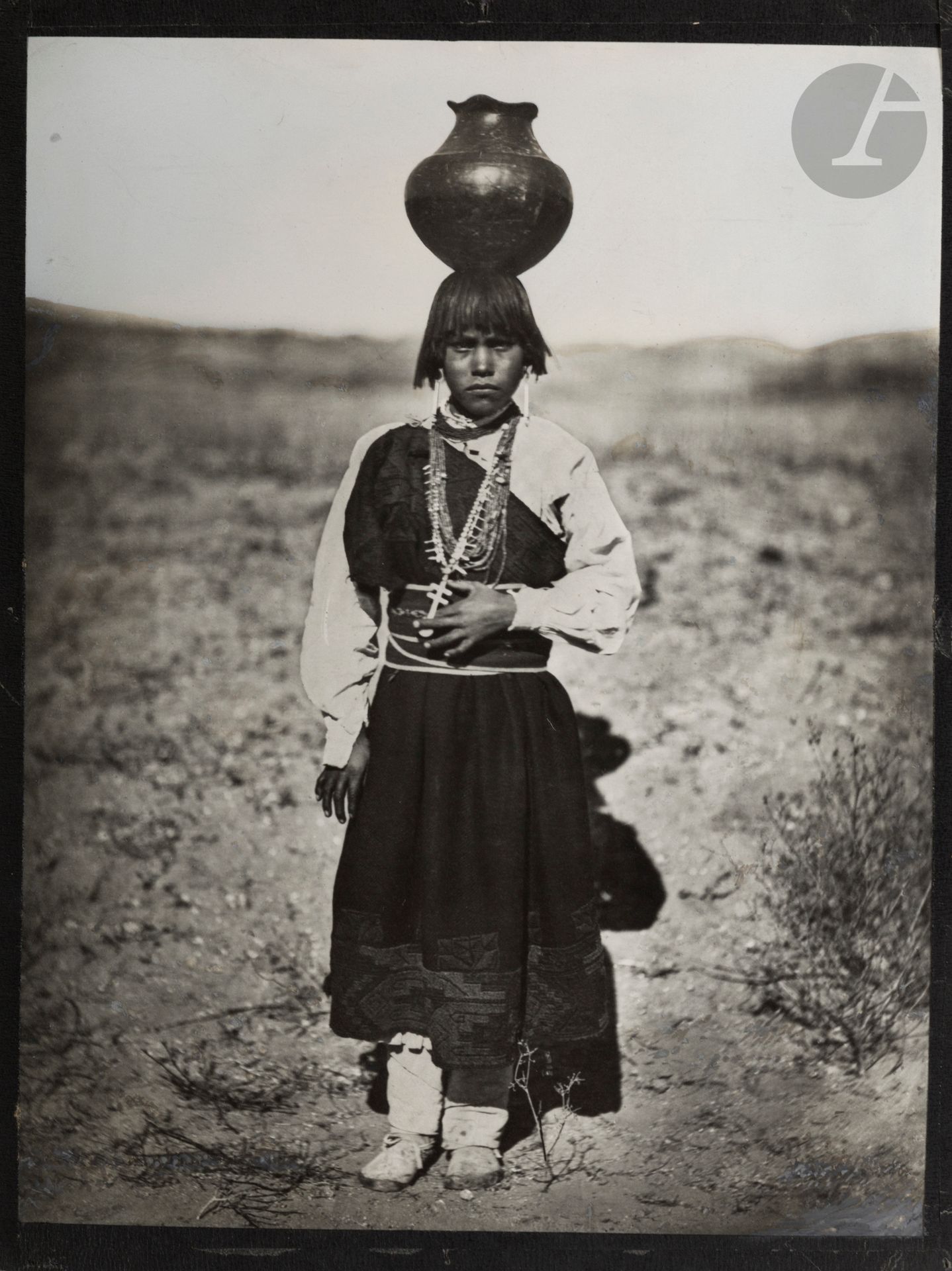 Unidentified photographer 
Young Native American girl, 
c. 1910. 
Vintage silver print, mounted on card. 
32x25.5 cm
