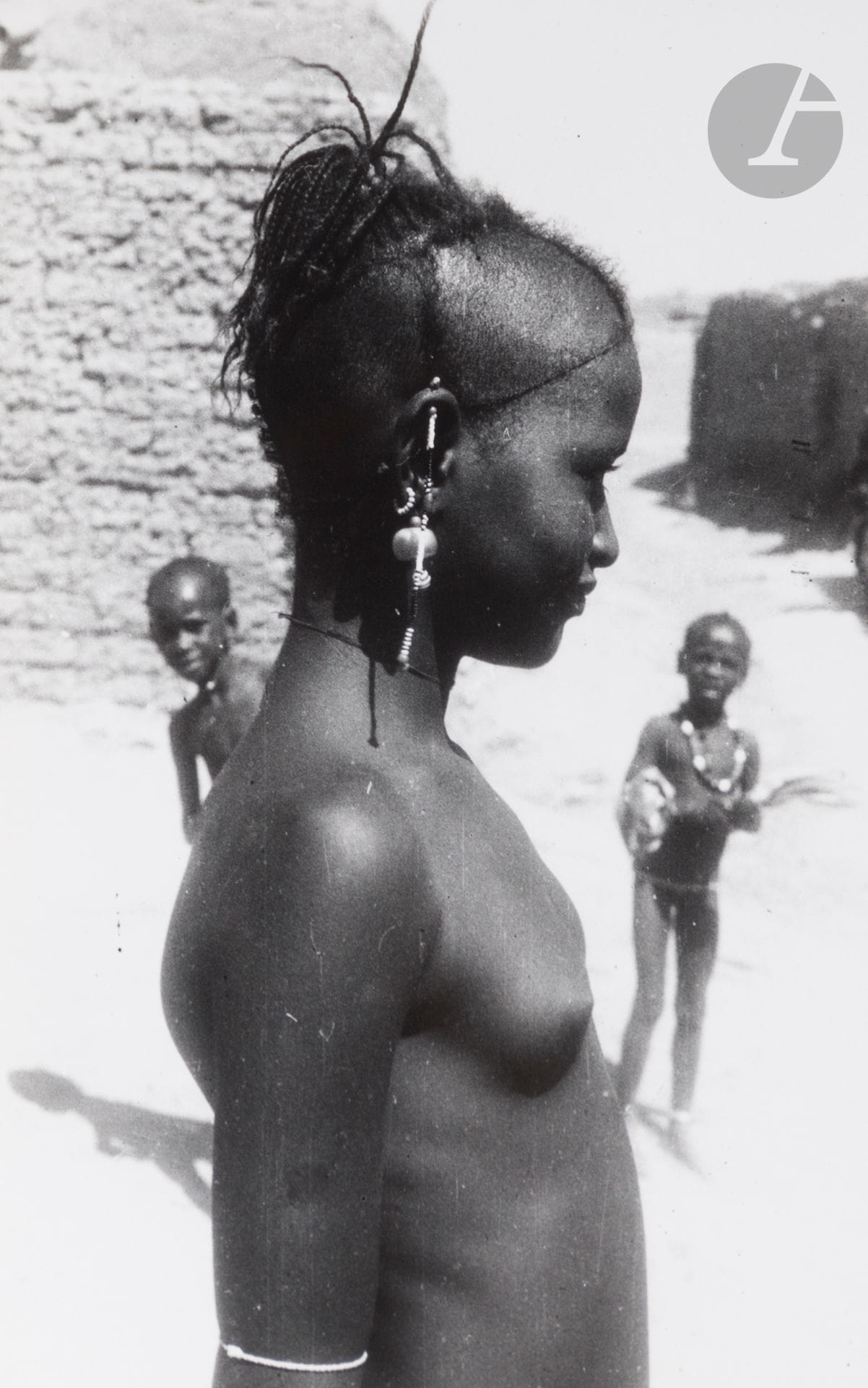 Unidentified photographer 
West Africa, c. 1960. 
Portraits. Traditional clothing and jewelry. Scarification. Liturgical objects. Pirogues. Dances. Religious ceremonies. 
Approximately 150 vintage silver prints on Agfa paper. 
Average format: 12x9 cm