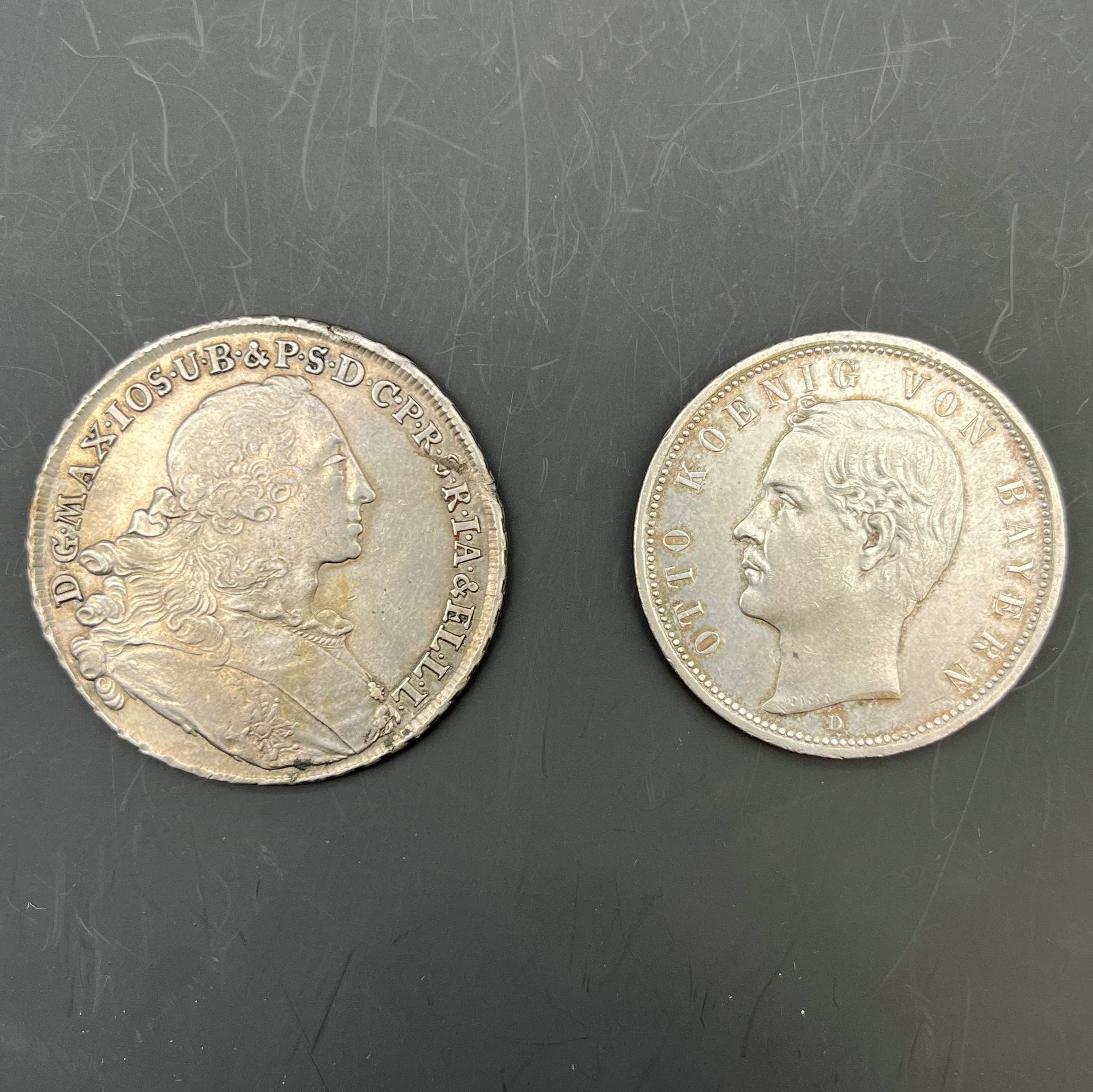 FOREIGN CURRENCIES 
Germany
BAVIERE. 
LOT of 2 silver coins:
Thaler of Maximilian III Joseph dated 1756 and 5 mark of Otto dated 1913. KM.501 and 915
The 2 TTB