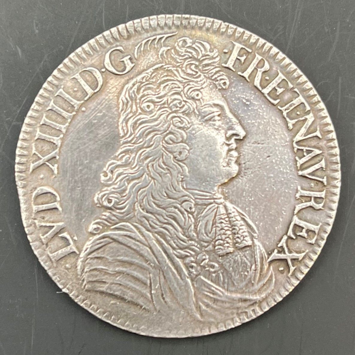 FRENCH ROYAL SILVER COINS
 LOUIS XIV (1643-1715)
Ecu à la cravate (unjustifiably called "du Parlement"), silver, 1st type, 1679, A=Paris.
D.1493
 Scratched field.
TB