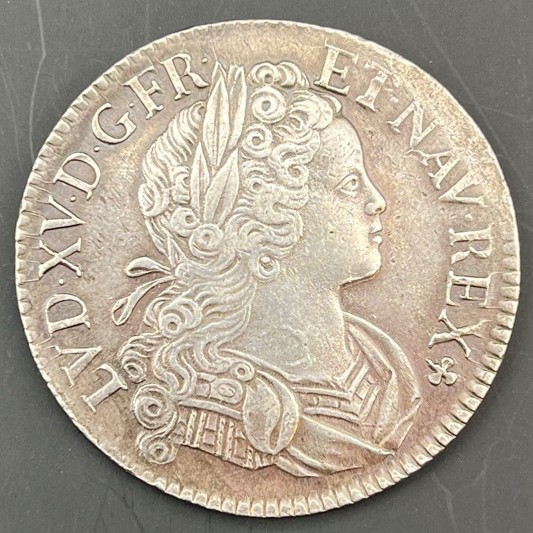FRENCH ROYAL SILVER COINS
 LOUIS XV (1715-1774)
Ecu de Navarre, silver, 1718, A=Paris. Edge filed over 2 cm.
D.1657
TB