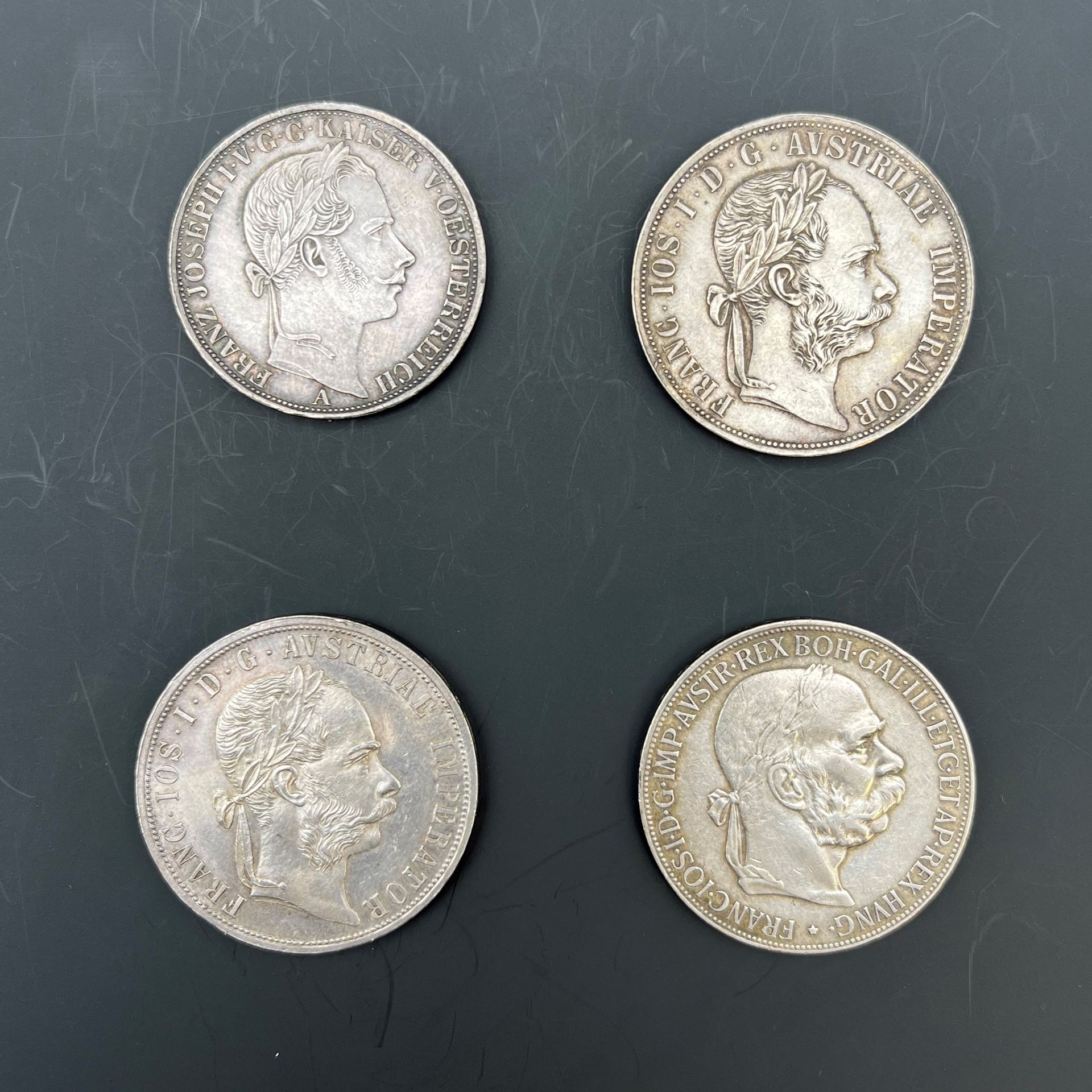 EMPIRE. François-Joseph (1848-1916). LOT de 4 monnaies en argent:
-Thaler 1759 A=Vienne (TTB), 2 florins 1875 (TTB), 2 florins 1891 (SUP),
-5 corona 1900 (TB).
KM.2244, 2233, 2807
-Les 4