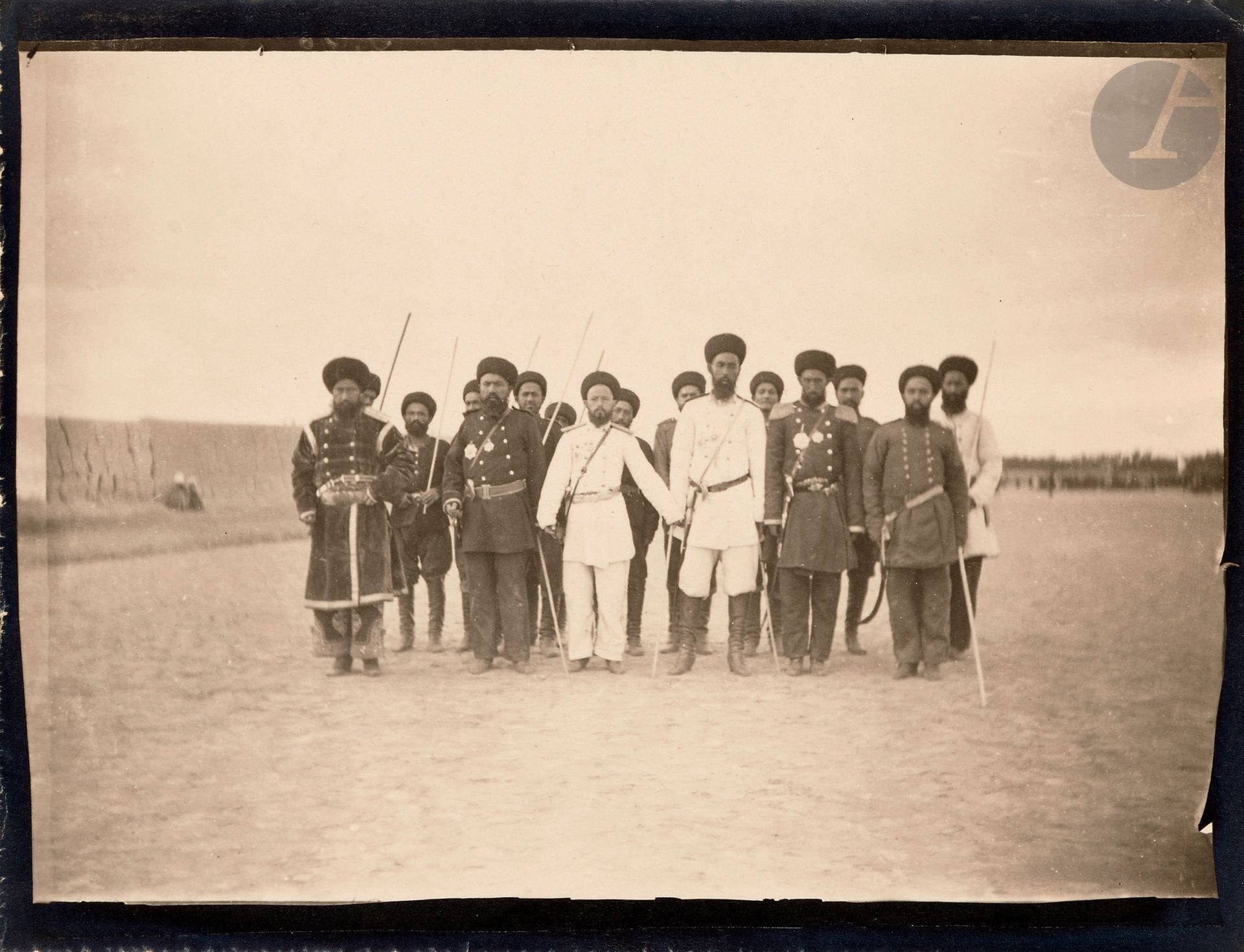 Paul Nadar (1856-1939)
Voyage au Turkestan. Août-novembre 1890. 
Tiflis. Bain turc et ancien pont sur la Koura. Vue du rocher Meteki et de la Koura depuis la citadelle Narikala. Le prince Gagarine. Batoumi, cavalier géorgien. Vendeurs tekkés proposant aux voyageurs des corbeilles de raisins. Famille tekkée devant une yourte de roseaux. Femme et cavalier géorgiens. Travaux des champs. Cultivateurs tadjiks, sartes ou kirghizes. Samarcande. Madrasa Ouloug-Beg. La prière. Marchand de pastèques et de grenades sur la place du Registan. Allée des peupliers. Tachkent, femmes sartes vêtues du parandja. Pavillon de Tachkent. Exposition Internationale de Tachkent. Passage d’un gué. Caravane de chameaux turkmènes. Merv. Tombeau du sultan Sandjar. Émir de Boukhara avec ses officiers et sa garde, invité à la revue militaire de Merv. Intérieur de la madrasa Koukeldach. Rue bordée d’échoppes. Caravansérail. Boukhara. Le fleuve Amou Daria. Tekké halant une barque sur la rive. Tchinaz, embarcadère sur le Syr-Daria. Enfants. Écoliers russes assistant à la bénédiction des troupes, à Merv. Deux fillettes dans une rue. Groupe d’enfants assis sur une terrasse, près de Chakhi Zinda. Jeune garçon montant vers une terrasse. Puits. Porteurs d’eau. 
80 épreuves argentiques d’époque, d’après négatifs souples, sur papier Gevaert Matt, inversées au tirage (prises de vues réalisées à partir du Kodak n°2 et de l’Express Détective Nadar). Quelques numéros de référence ou inscriptions dans le négatif (Détective).
Format moyen des épreuves : 16 x 12,5 cm 
Diamètre moyen des ronds : 8,8 cm 

Bibliographie : 
- Anne-Marie Bernard, Claude Malécot, L’Odyssée de Paul Nadar au Turkestan. 1890. Photographies de Paul Nadar, Paris, Centre des Musées Nationaux/ Monum, éditions du Patrimoine, 2007. 
- Mathilde Falguière, Michel Poivert, Paul Nadar. Payram. Dialogue photographique sur la route de la soie, Marseille, Éditions Le Bec en l’air, 2018. 

Provenance : 
Collection François Lepage, Paris.