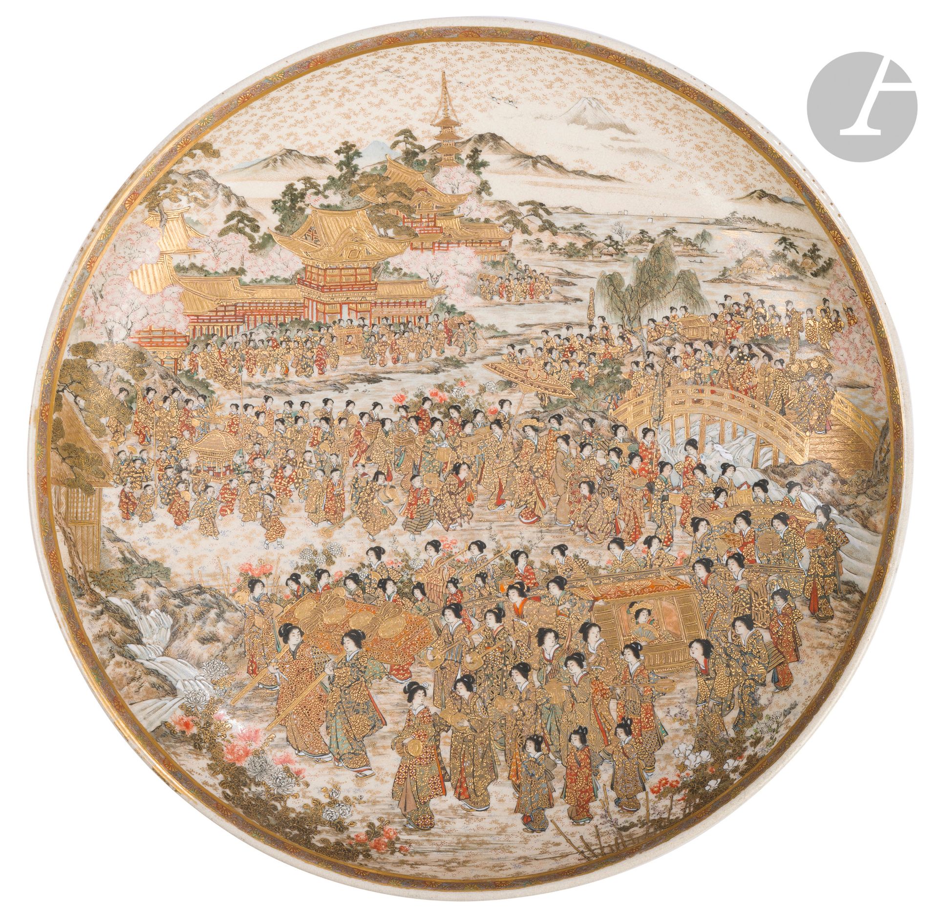Large Satsuma (Yokohama Satsuma) earthenware dish, Japan, Meiji period (1868-1912)
This dish features a polychrome and gilded decoration depicting a Shinto ceremony. In the background, against a backdrop of mountains, we see a Shinto shrine, from which a procession of women and children starts, busy with various activities: carrying palanquins and chests, playing various musical instruments. On the reverse, a gold and red enamel mark consisting of two crossed Japanese flags and the inscription Daï Nipponkoku tei Hotoda sei zō - 大日本国帝保土田製造.
Diameter: 31 cm