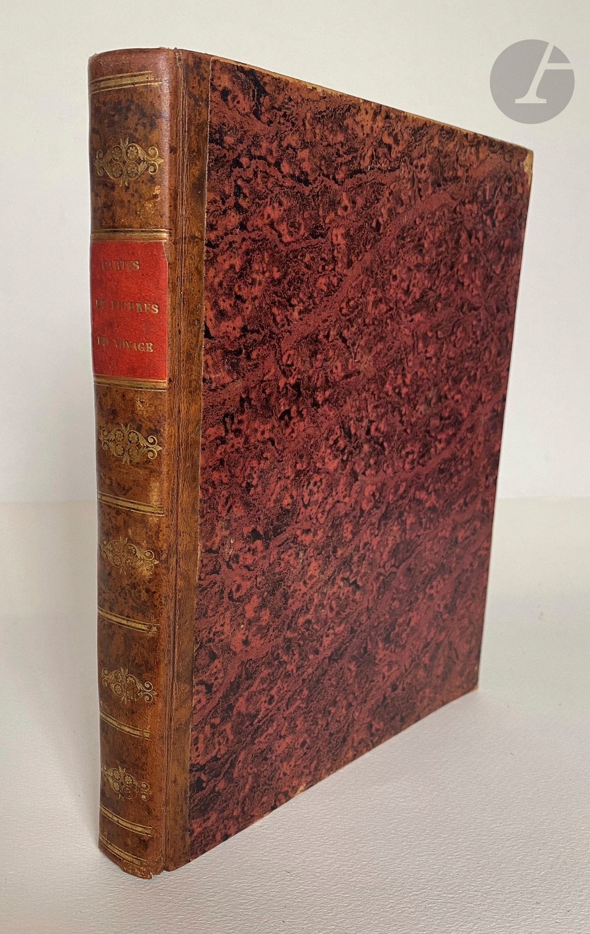 BRUCE (James).
Cartes et figures du voyage en Nubie et en Abyssinie.
Paris : Plassan, 1792. - In-4, half marbled calf, ornate smooth spine, marbled edges (early 19th century binding).

The only atlas to accompany the French edition published between 1790 and 1792 of Voyage aux sources du Nil, en Nubie et en Abyssinie, pendant les années 1768, 1769, 1770, 1771 &amp; 1772 by the Scottish traveler James Bruce and of Voyage de Paterson chez les Hottentots et les Cafres.

James Bruce travelled through a large part of Ethiopia for 4 years, in search of the true sources of the Nile. He believed he had discovered them, when in fact they were only the Nile of Abyssinia, also known as the Blue Nile, Bah-rel-Azrek or Abaï, already described by his predecessors. When it was published, his account was shunned by the public, so much so that the facts described therein provoked doubt and bewilderment among unbelieving scholars and explorers. The veracity of his account was only belatedly recognized, thanks to the travelers Combes, Tamisier and Léon Delaborde, with the exception of his discovery of the sources of the Nile. 

The atlas comprises 88 plates, including 84 engravings depicting fauna, flora, costumes, antiquities and views of the countries visited, and 4 large fold-out maps. The first 65 plates and the first 3 maps concern James Bruce's voyage, while the other engravings illustrate Paterson's.

Two tears, one restored, on the first two leaves, with damage to a figure in the list of plates. Some foxing and spotting. The lower edges of the first 8 plates and plates 24 and 25 show tears. Small tears, not missing, at the folds of the maps.
